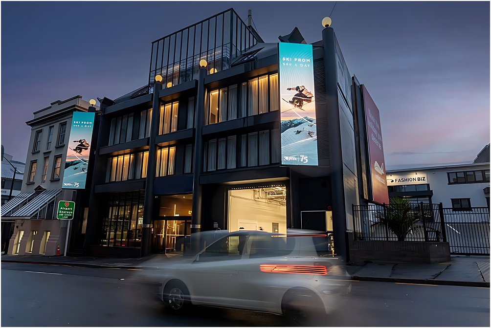 Exterior of The Viv Hotel at night