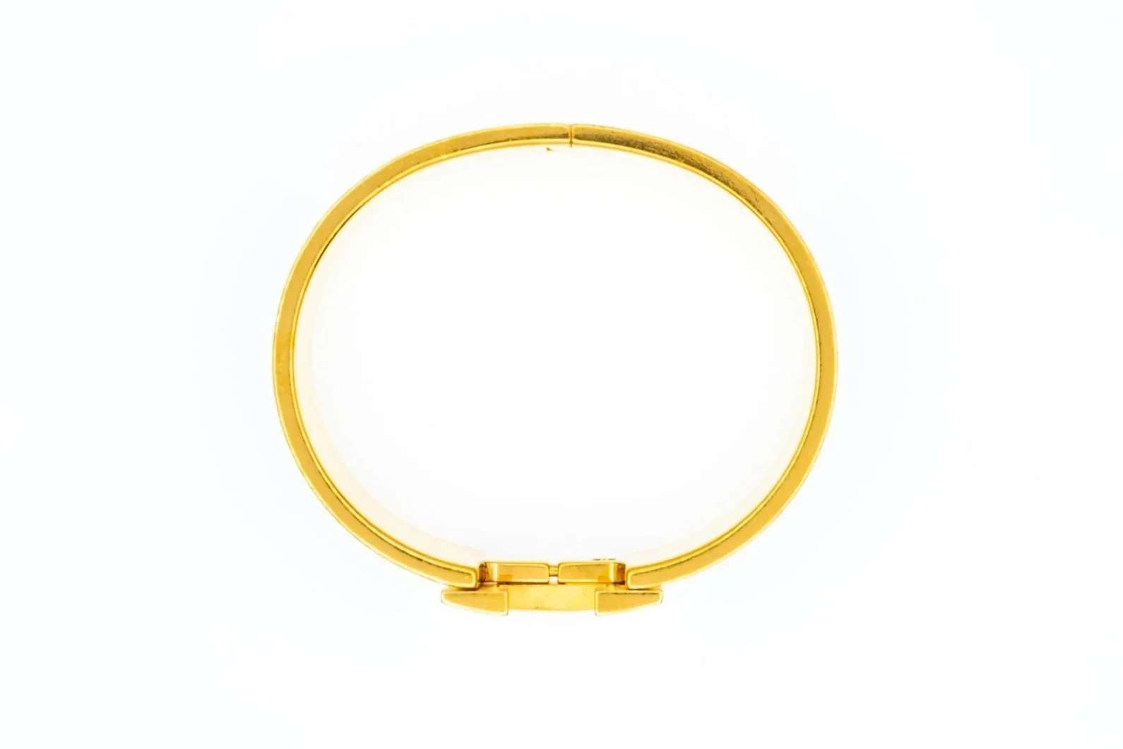 (T)Gold Toned Black Enamel Hermes Clic H Hinged Bracelet