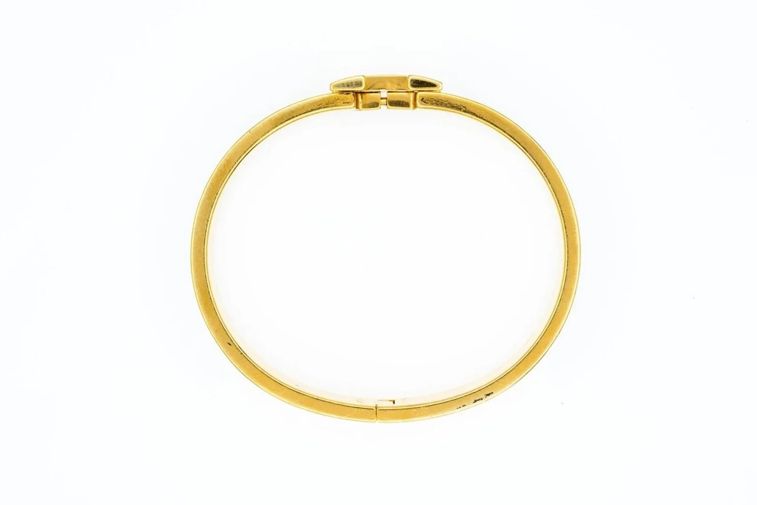 (T)Gold Toned Black Enamel Hermes Clic H Hinged Bangle Bracelet