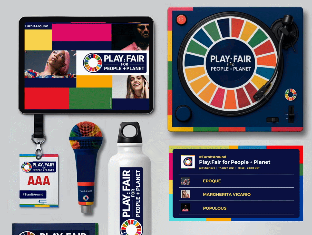 Collection of items promoting the SDG Action Awards, including a laptop, badges, posters, pens, water bottle, brochure, and a photo of diverse people holding SDG symbols, all featuring the SDGActionAwards logo and themes of global sustainability and social action.