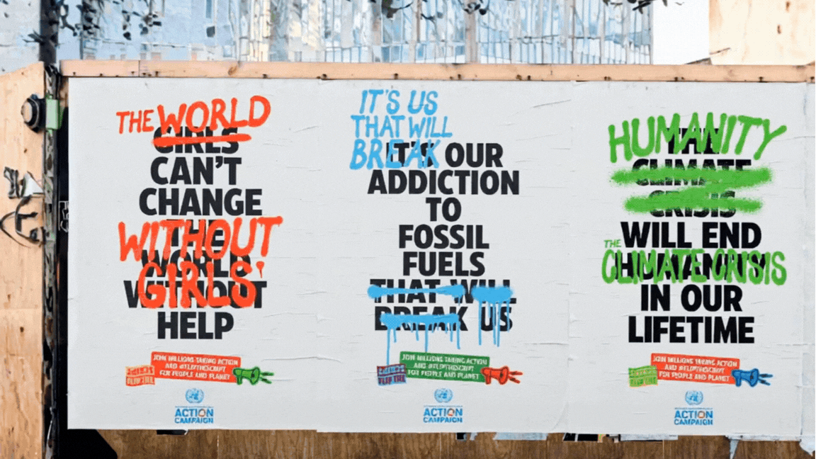 Models walking down the runway during a fashion show, with audience members seated on either side.