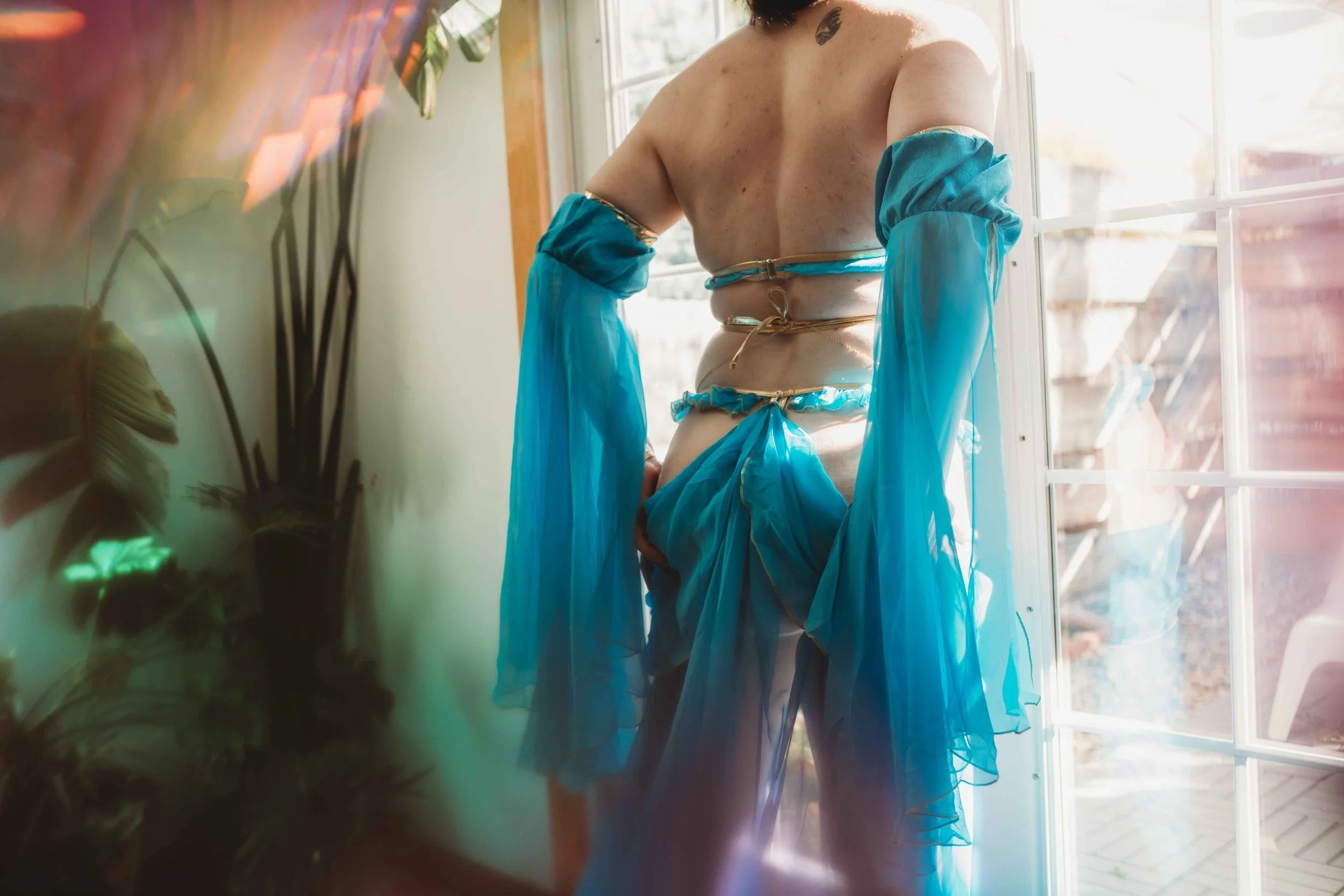 Trans woman boudoir photography in Boise studio – confidence and empowerment