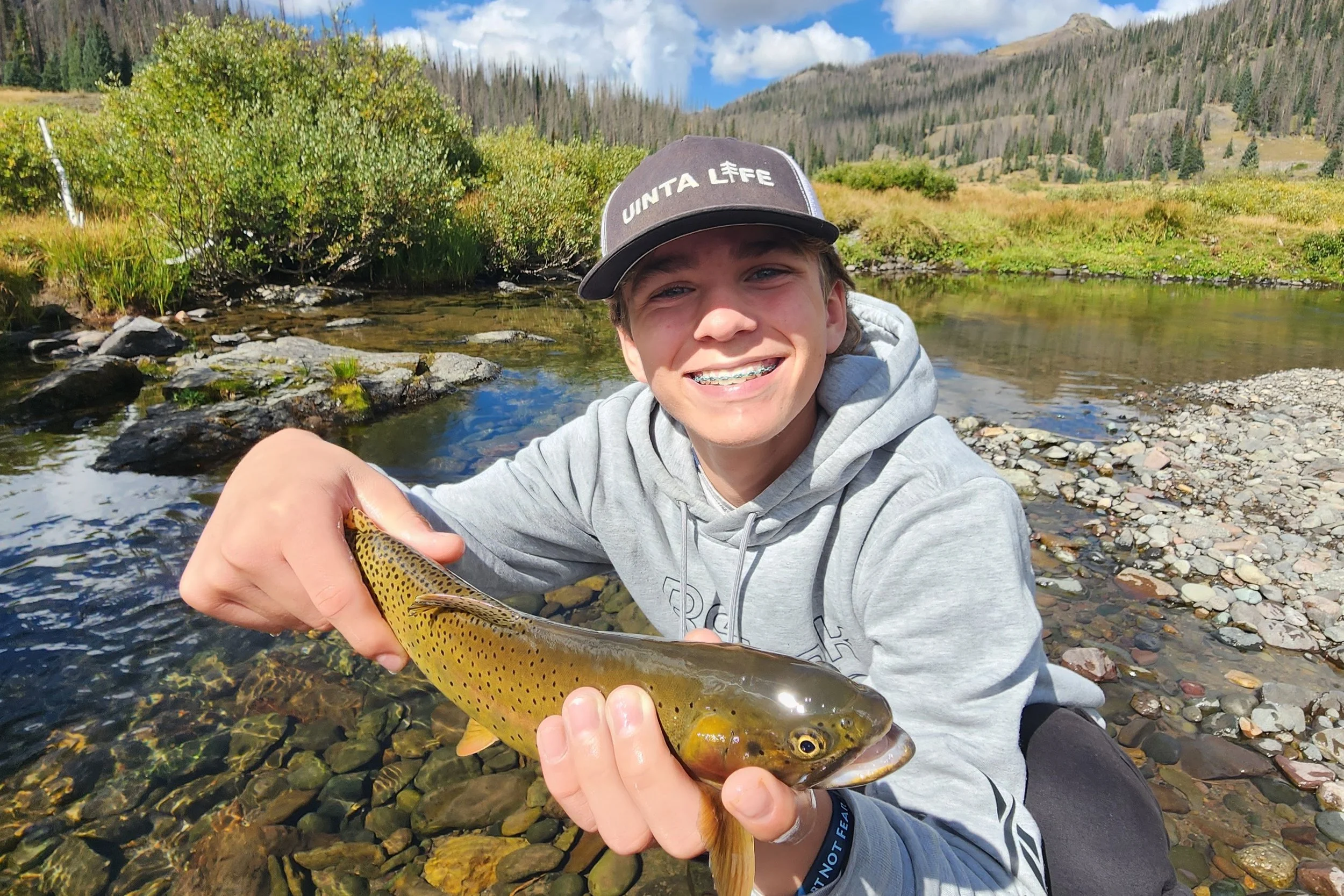 A cutthroat trout caught fly-fishing in the High Uintas