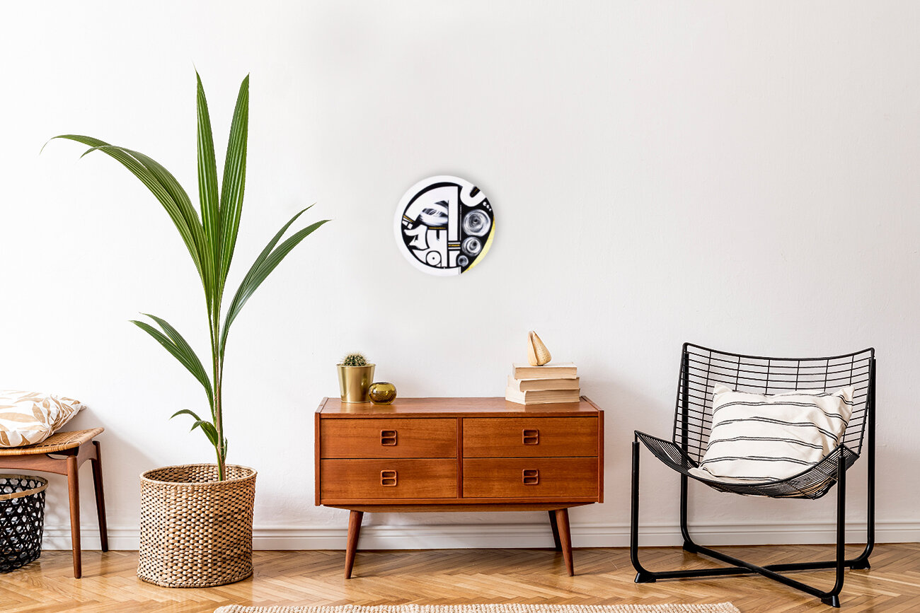 black white gold face figurative abstract round artwork staged in contemporary room