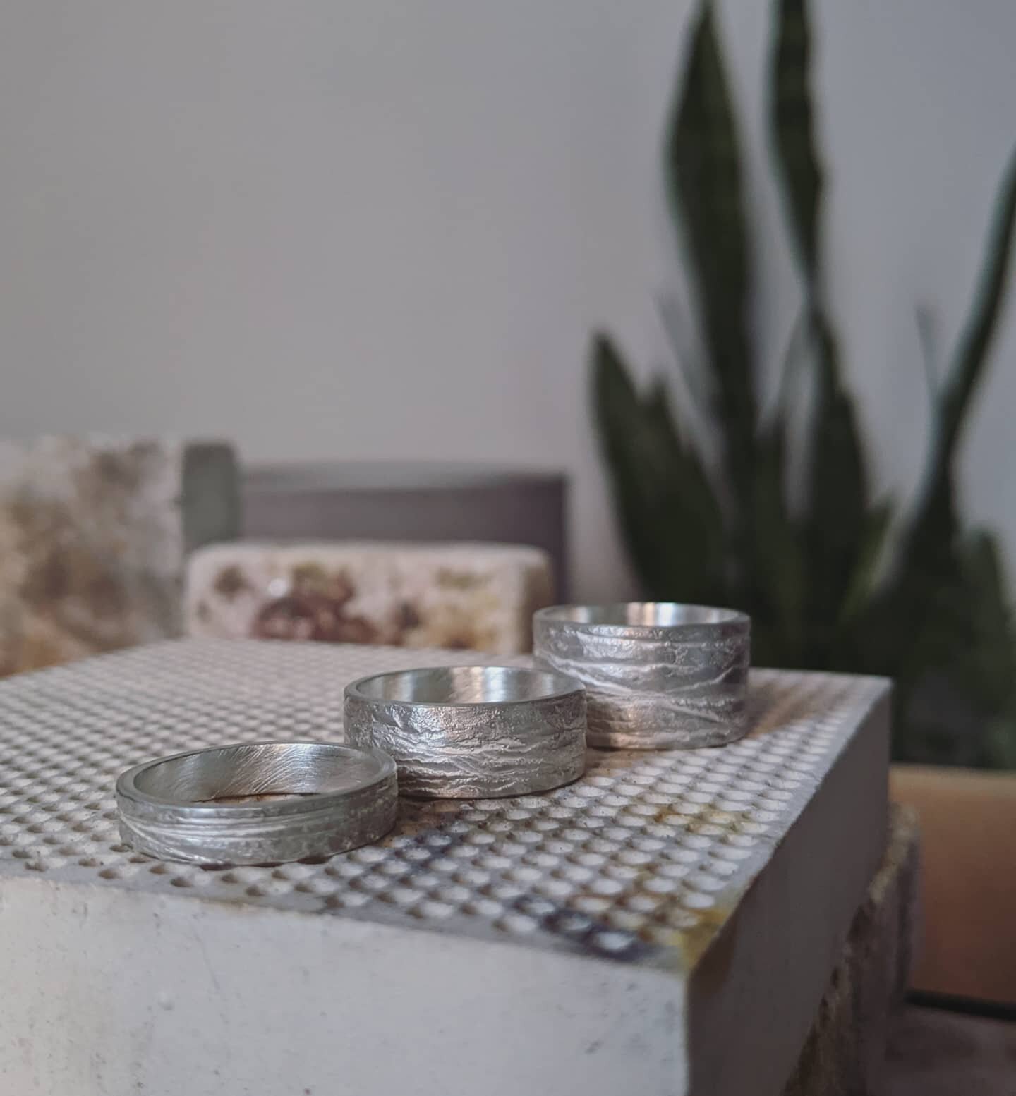 A little progress shot with the last of the daylight. Three hammer textured recycled silver rings in 4, 7 and 11mm widths.