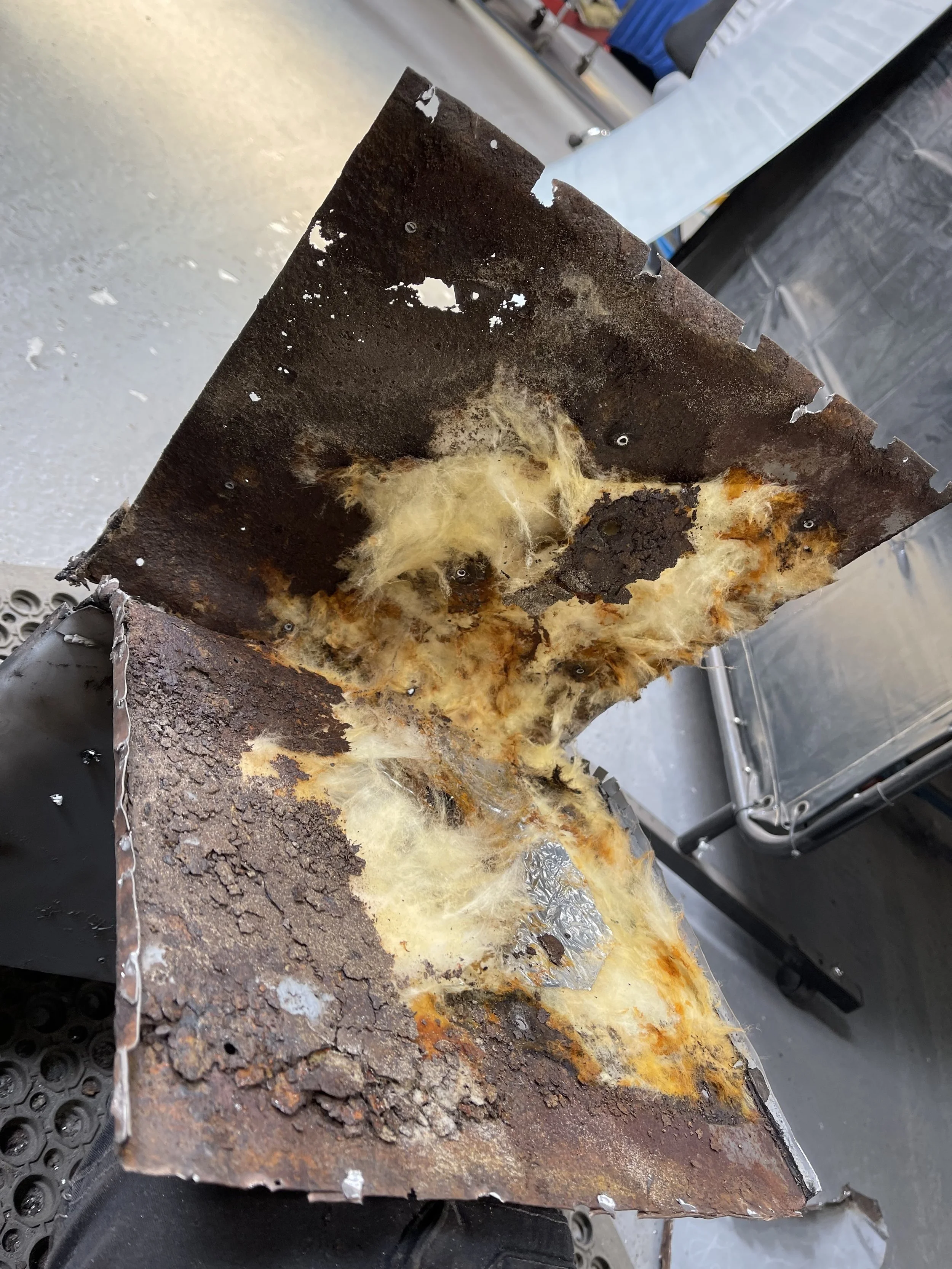 Ferrari 275 GTB/6C pedal box insulation between the inner and outer skin. 