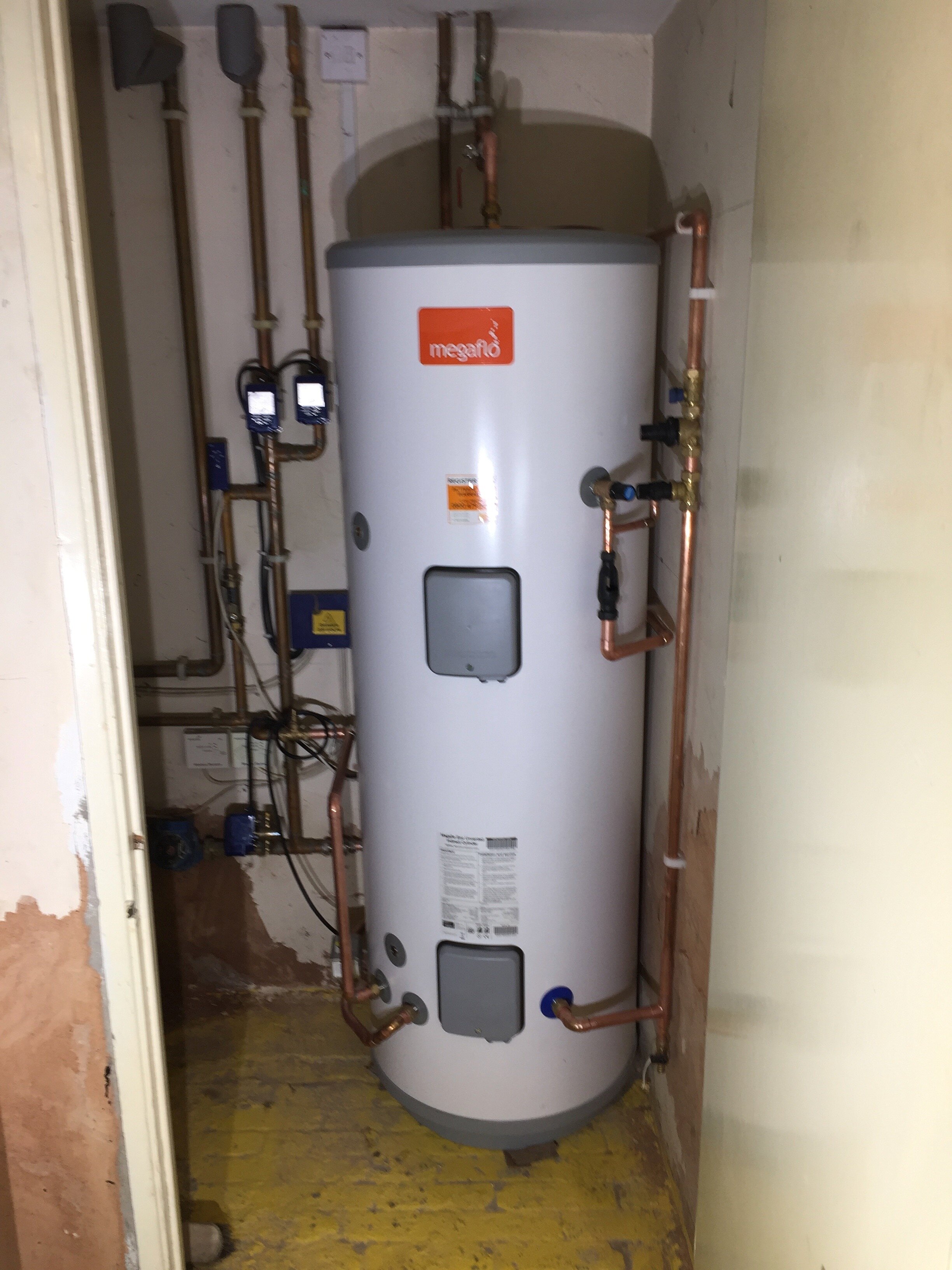 Residential conversion of indirect vented hot water cylinder to indirect unvented hot water cylinder