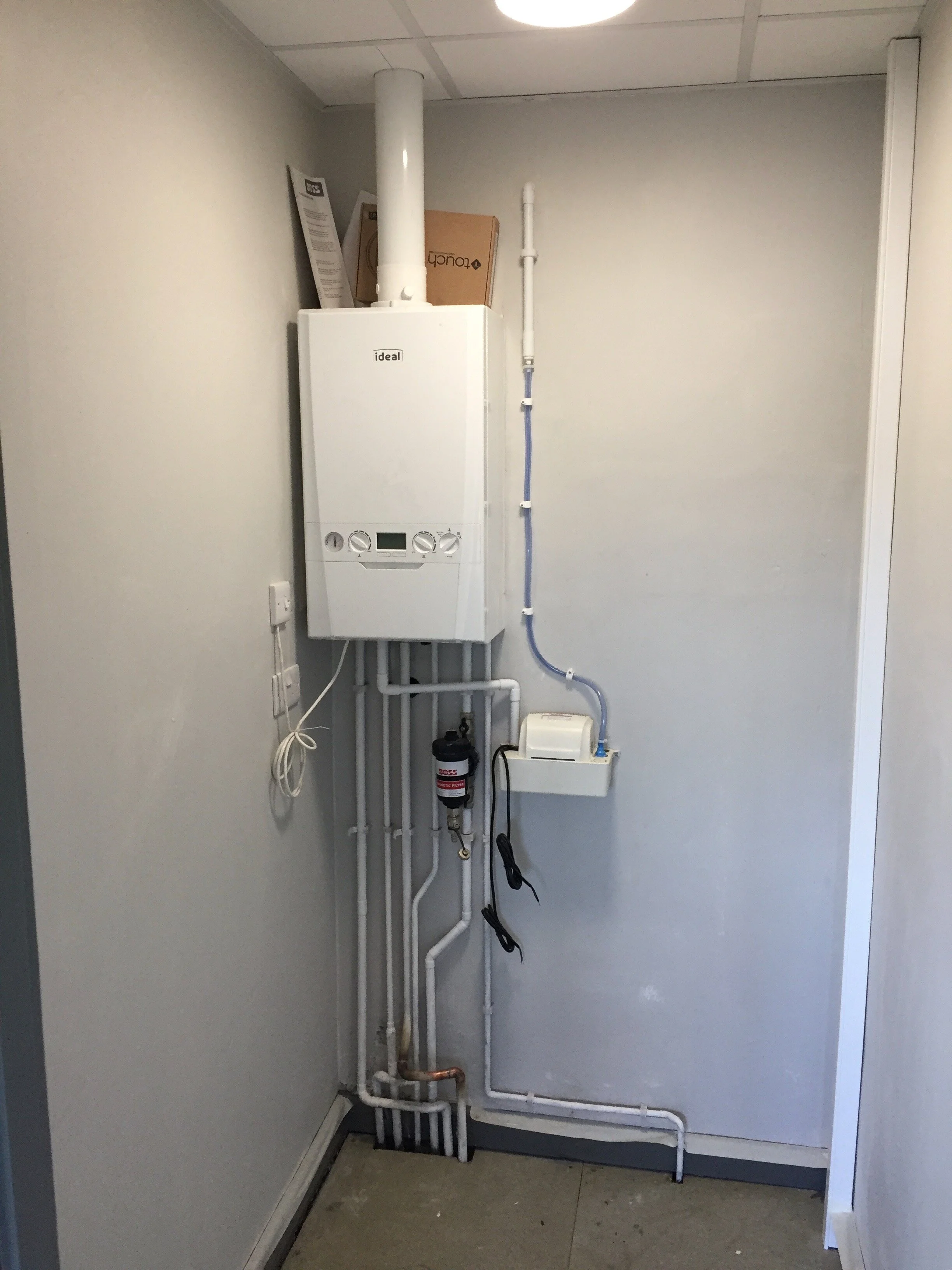 Corporate office building boiler and system conversion