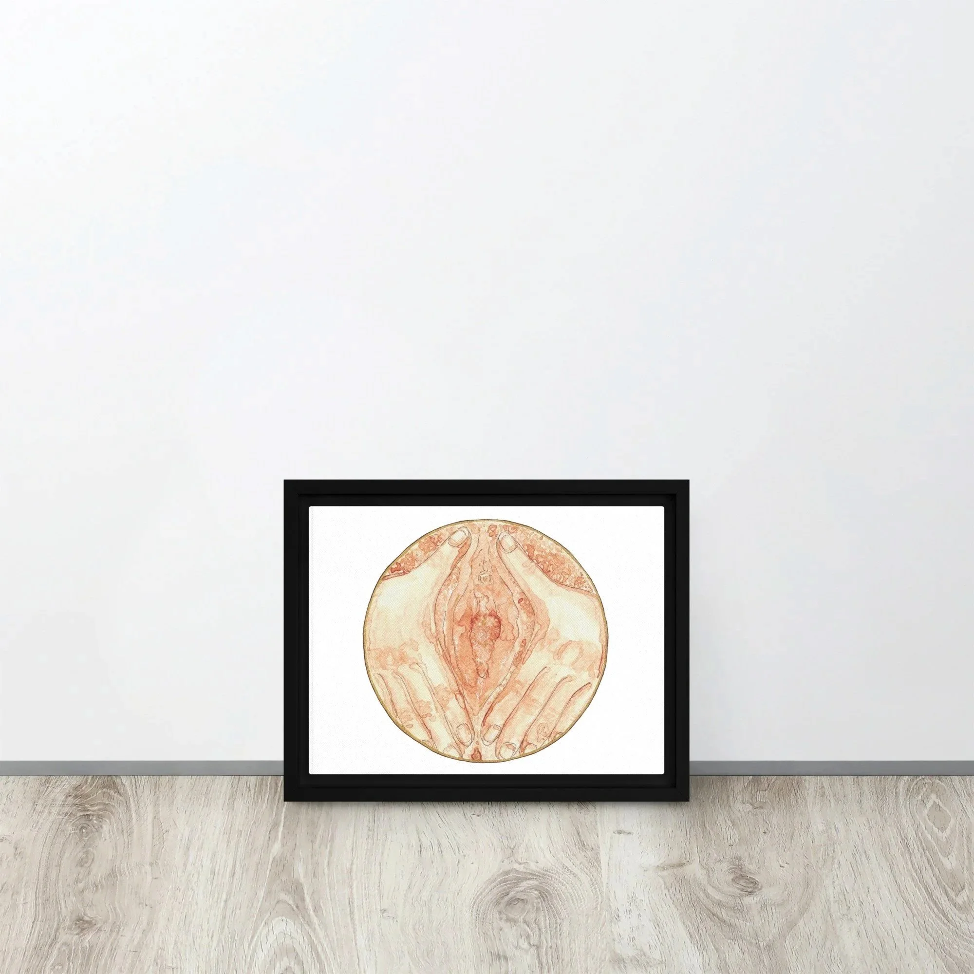Framed periodblood artwork of a vulva framed by hands.