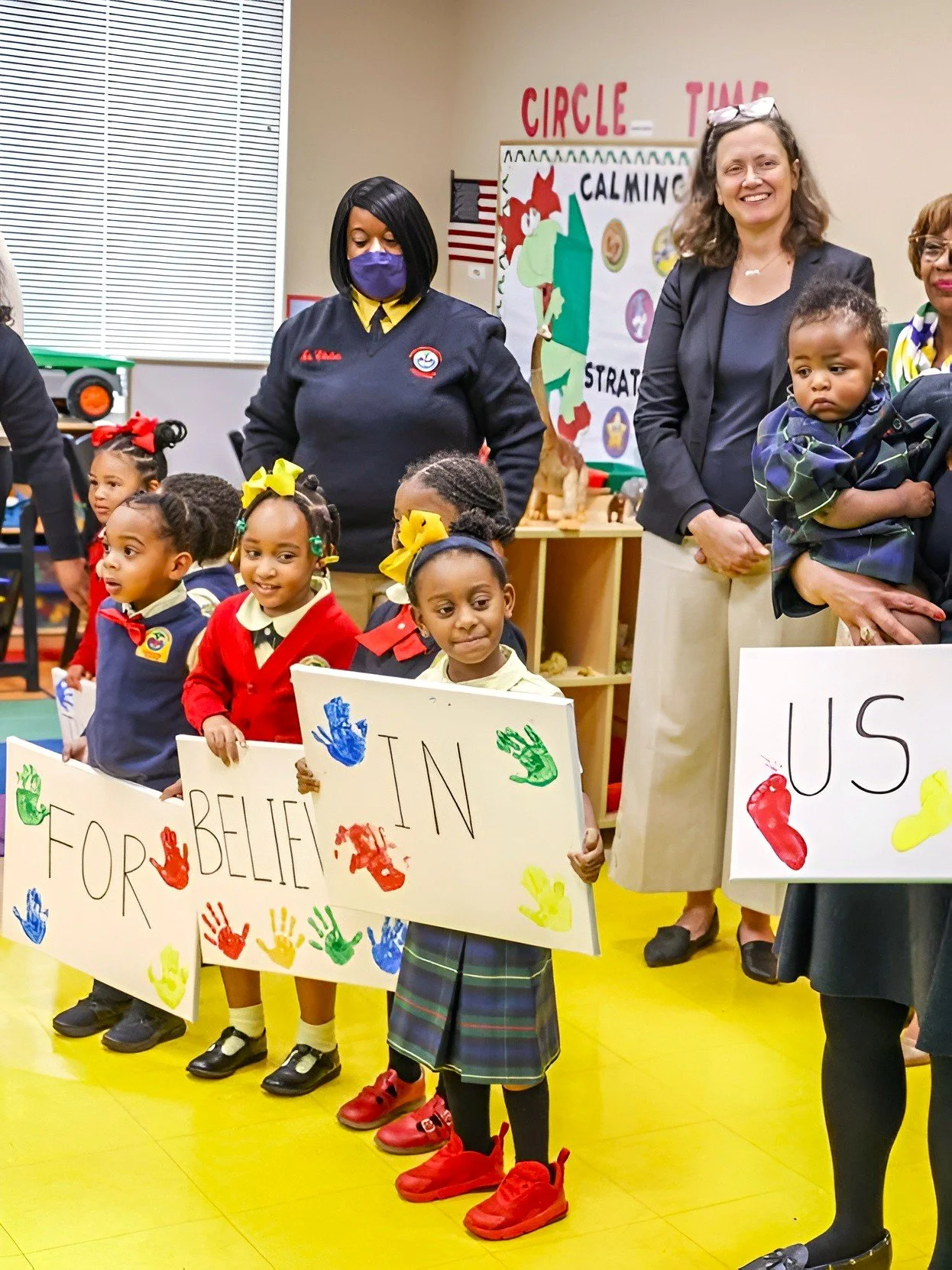 Members of NOLA Public Schools visit The PLC, where students hold a welcoming event.