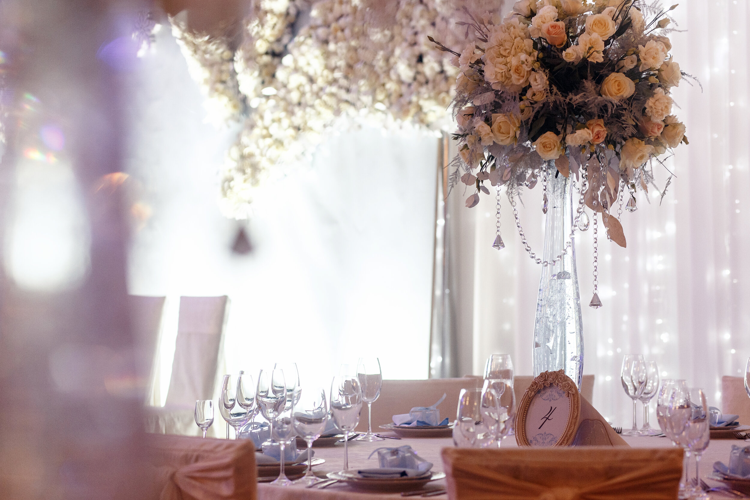 Luxury Wedding Decor With Flowers And Glass Vases And Number  Of