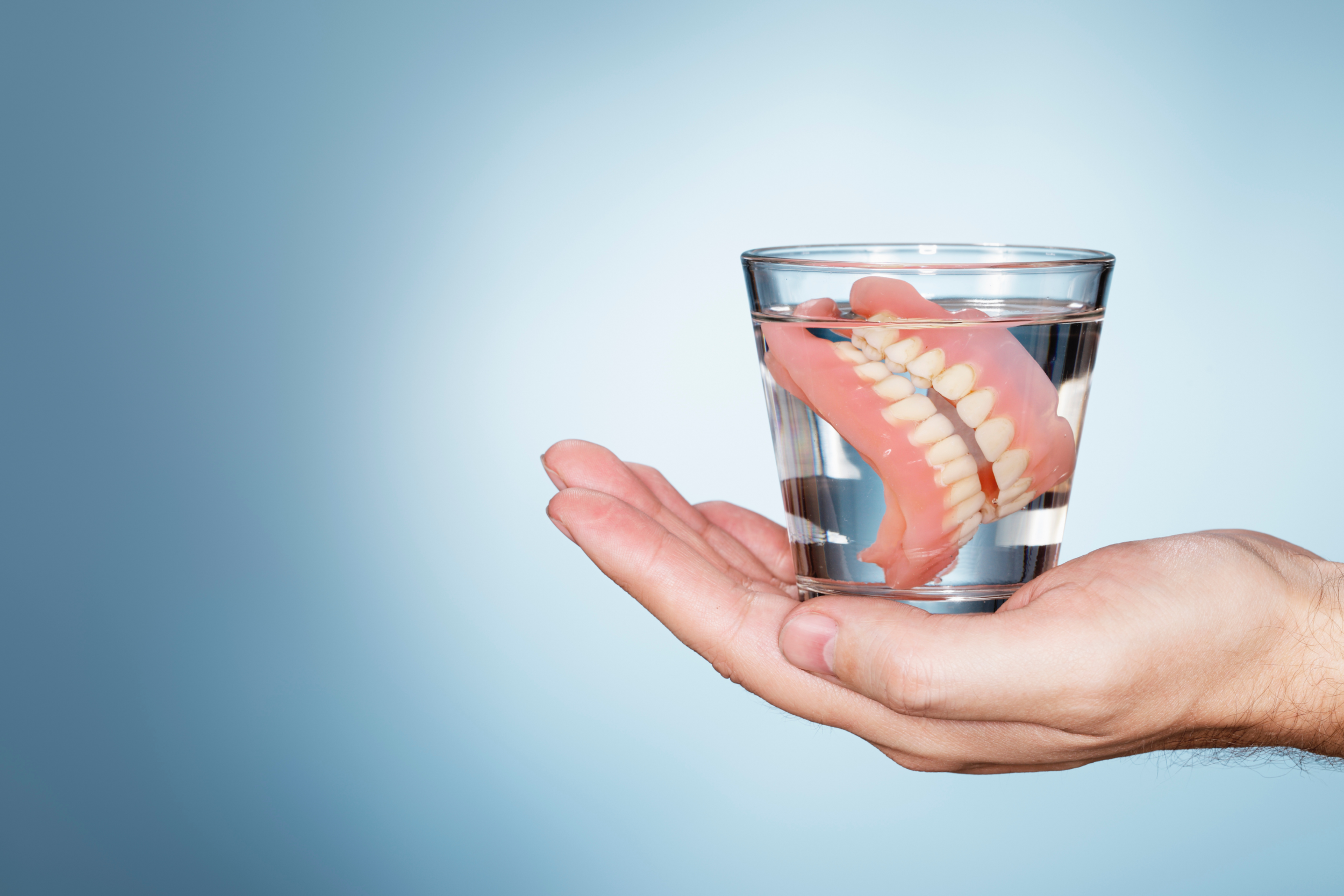 How to Choose Dentures or Implants — and Why