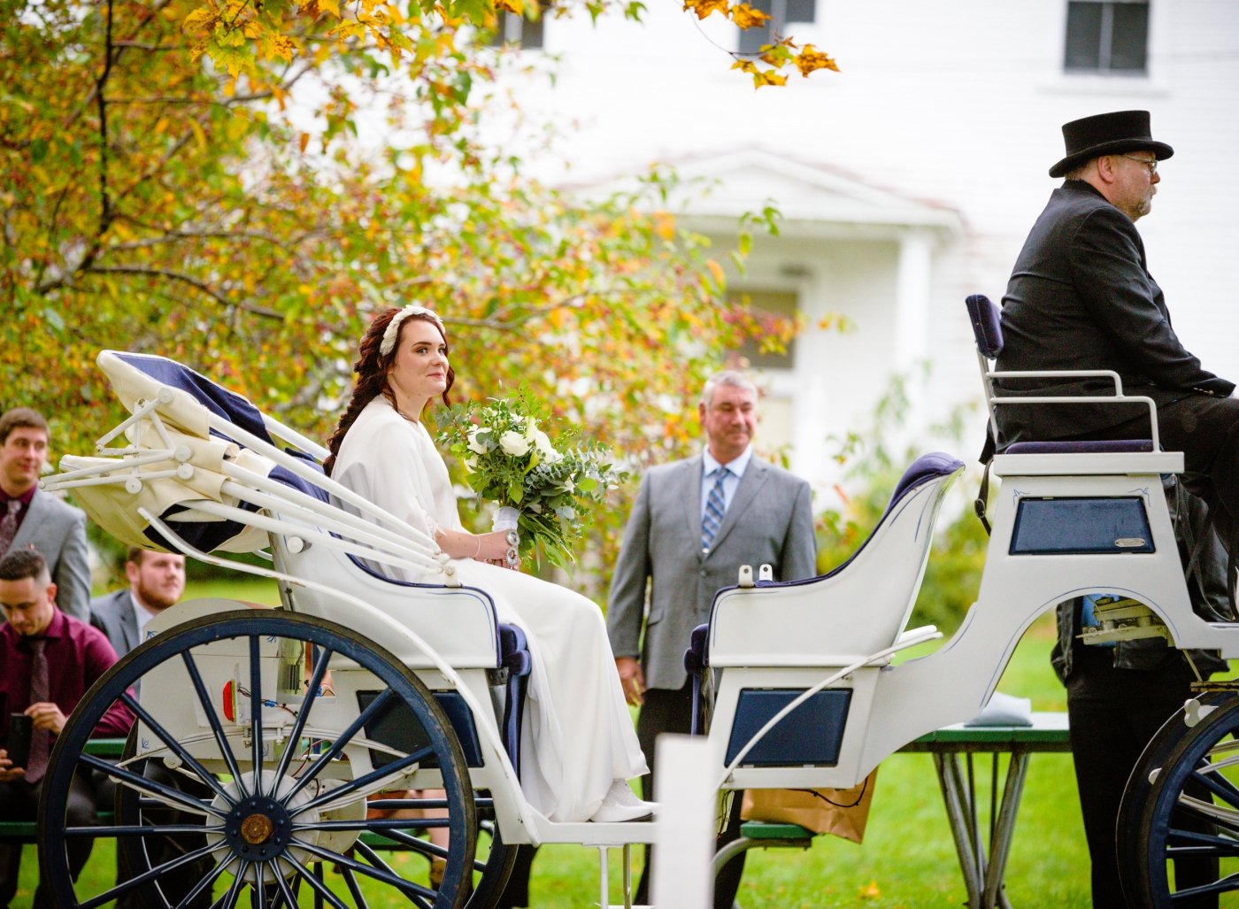 bride arriving in horse and carriage