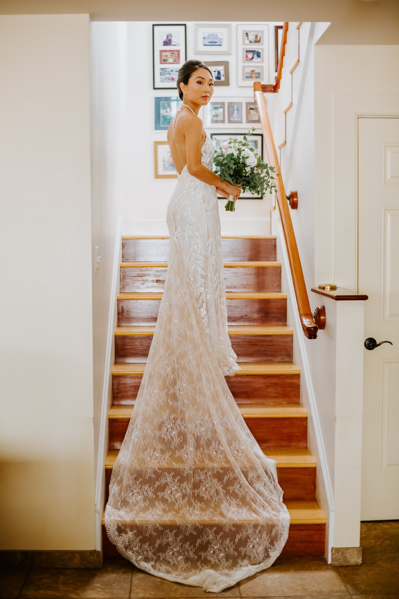 bride in elegant lace gown with lace train
