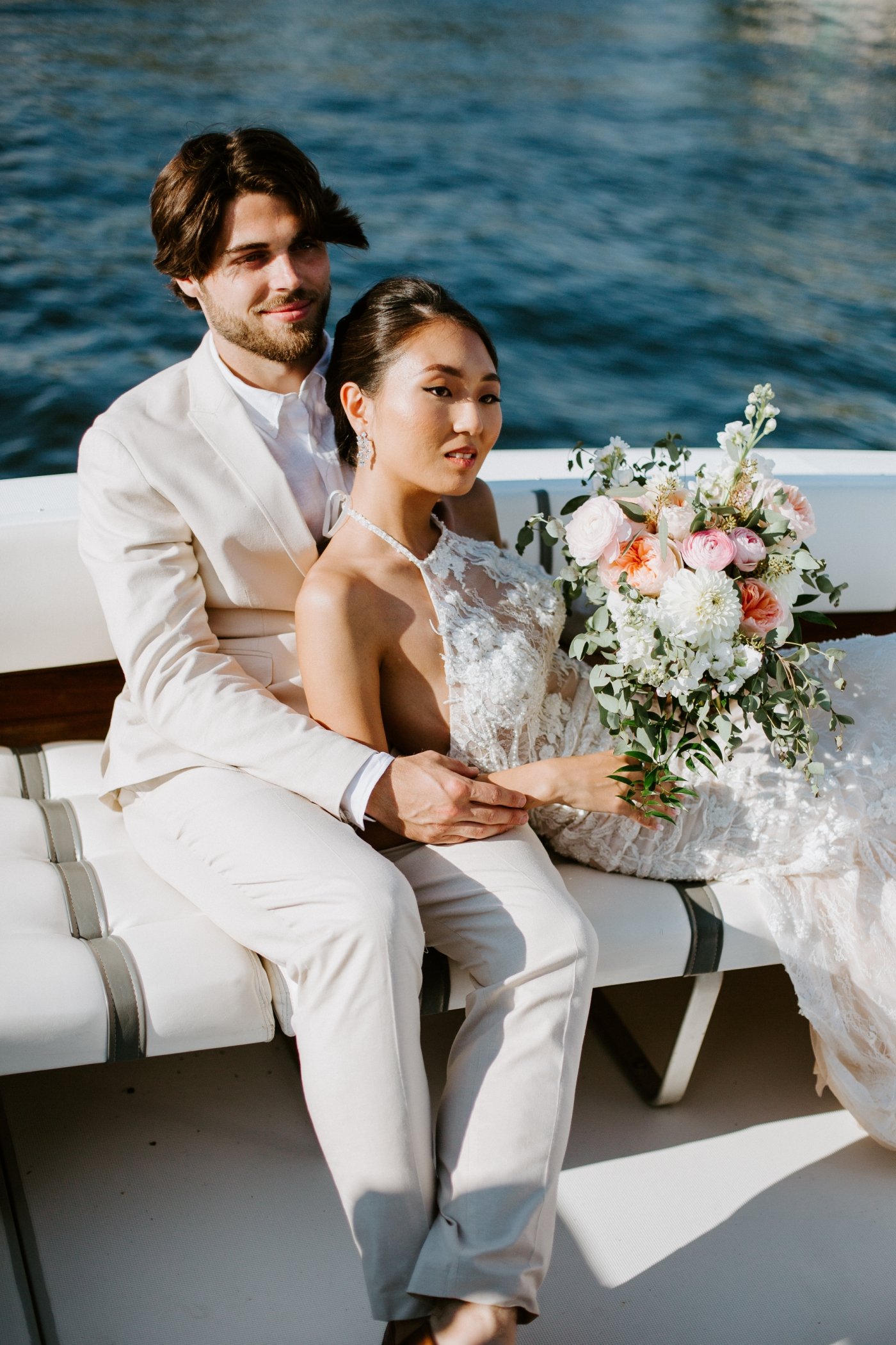 bride and groom portraits on boat