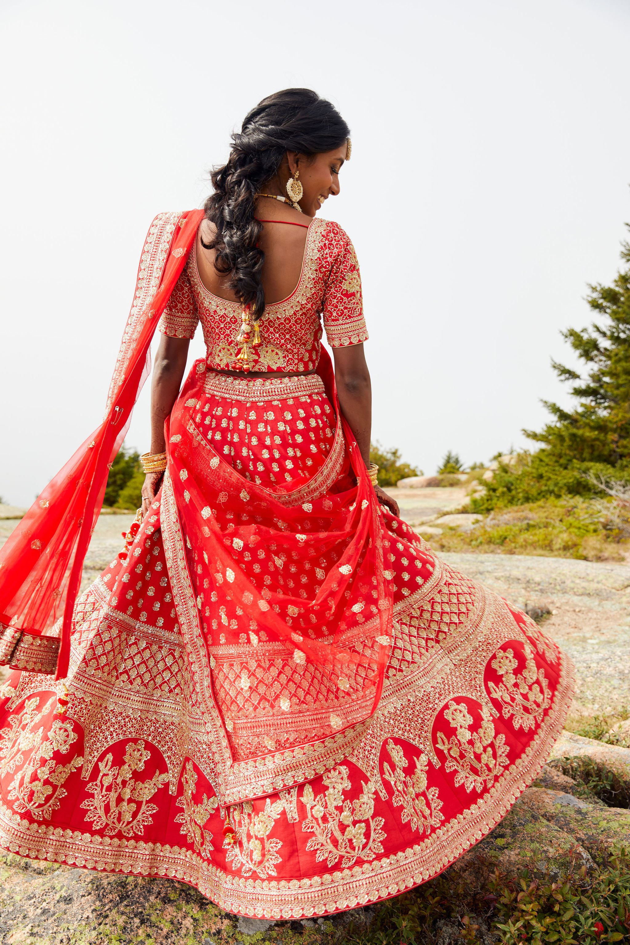 bride in traditional red lehenga