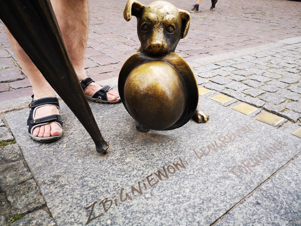 Statue dedicated to famous Polish cartoonist of one of his beloved characters, Filuś the dog