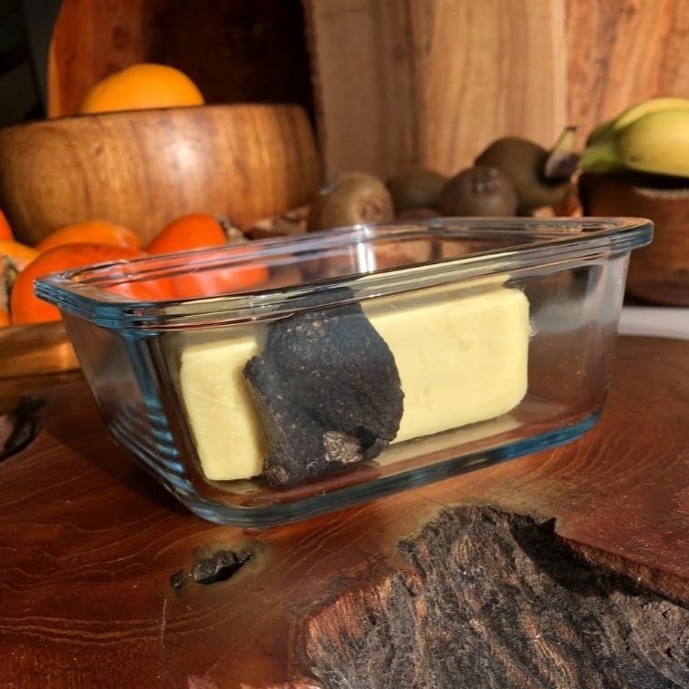 Leave truffle in a glass container with butter for five days to infuse the aromas.