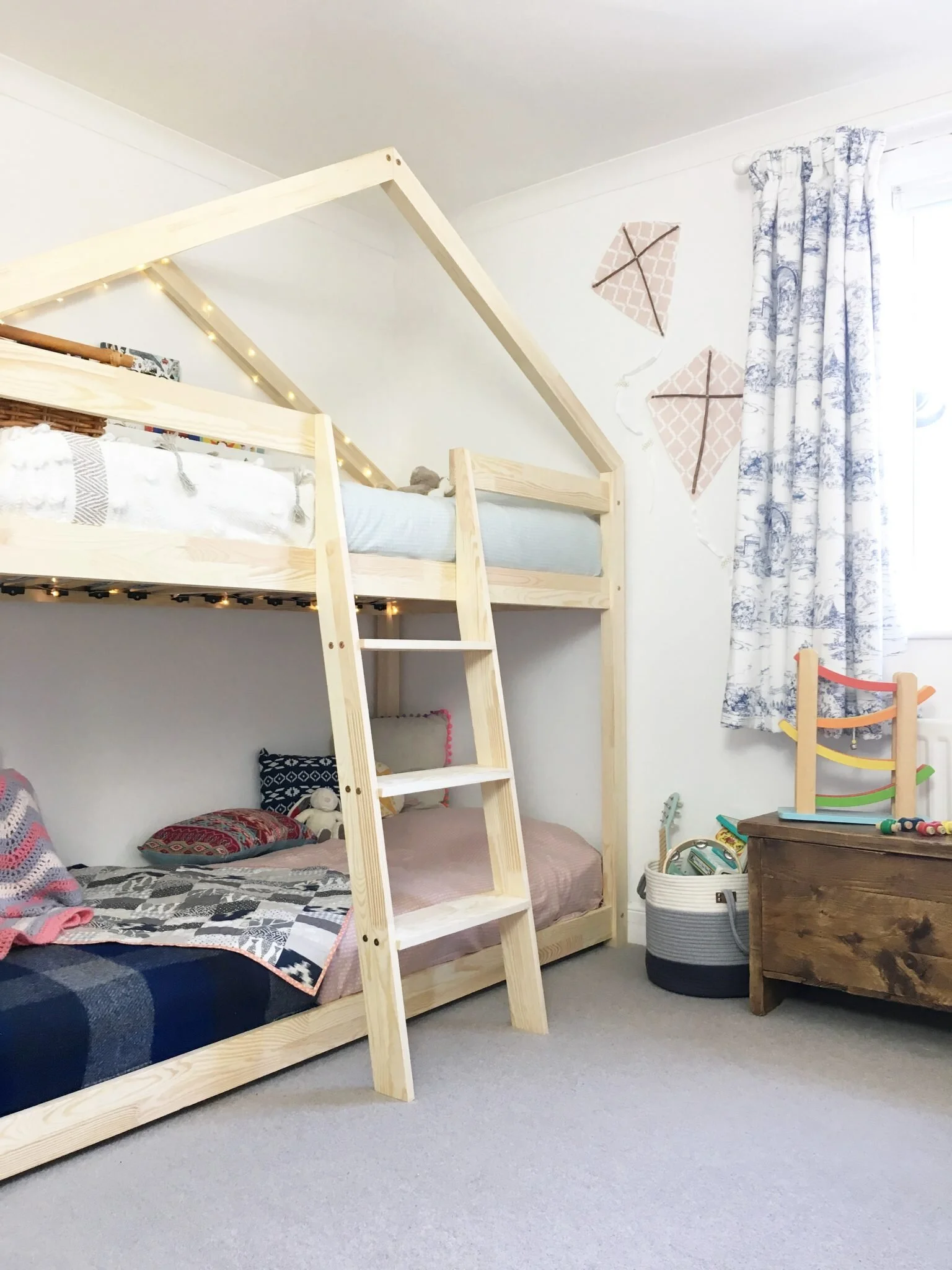 Our girls' shared bedroom with bunk beds