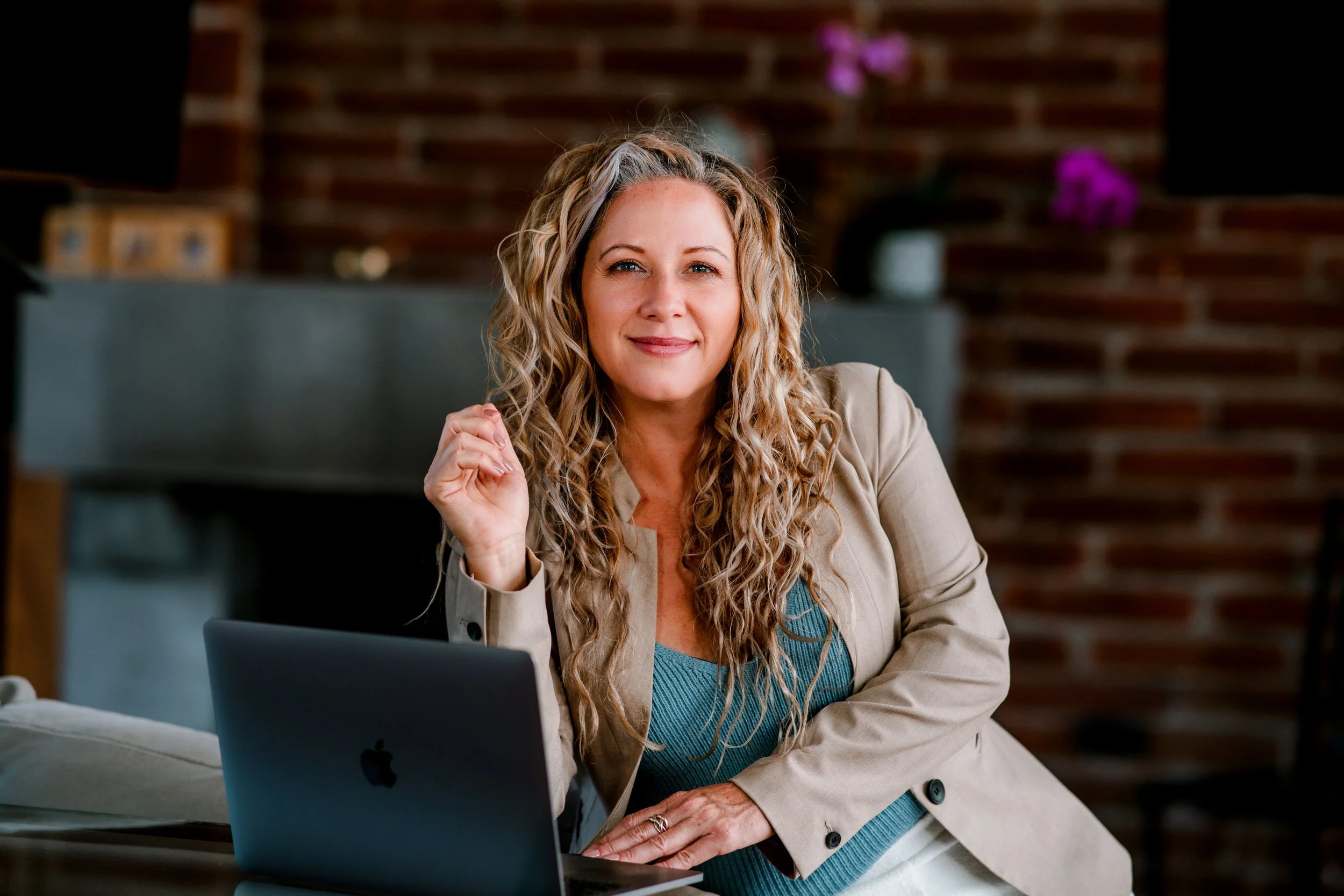 Jamie Jenkins sitting at desk with computer