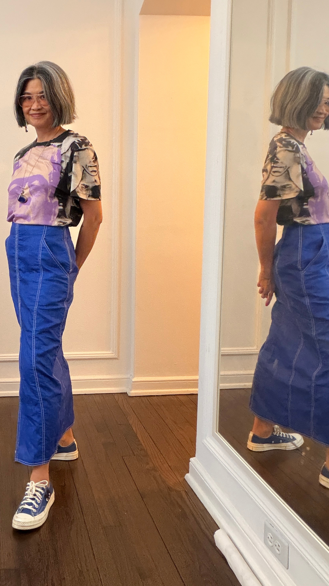 Layering a vibrant piece into a modern, wearable outfit