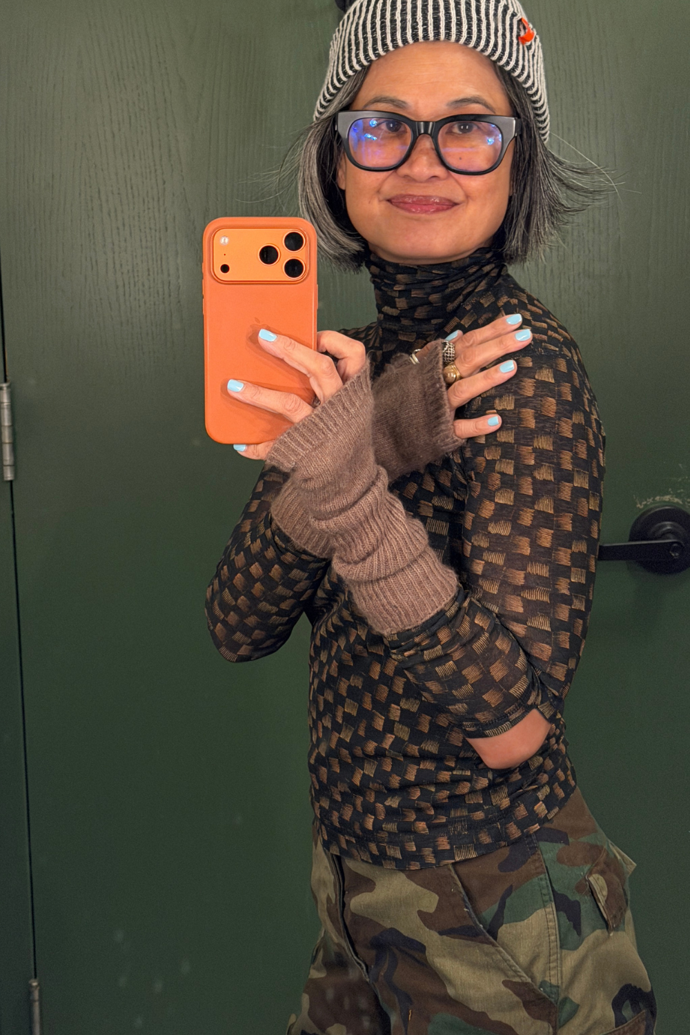 Cuffed camo pants styled for a casual daytime errands outfit in Chicago