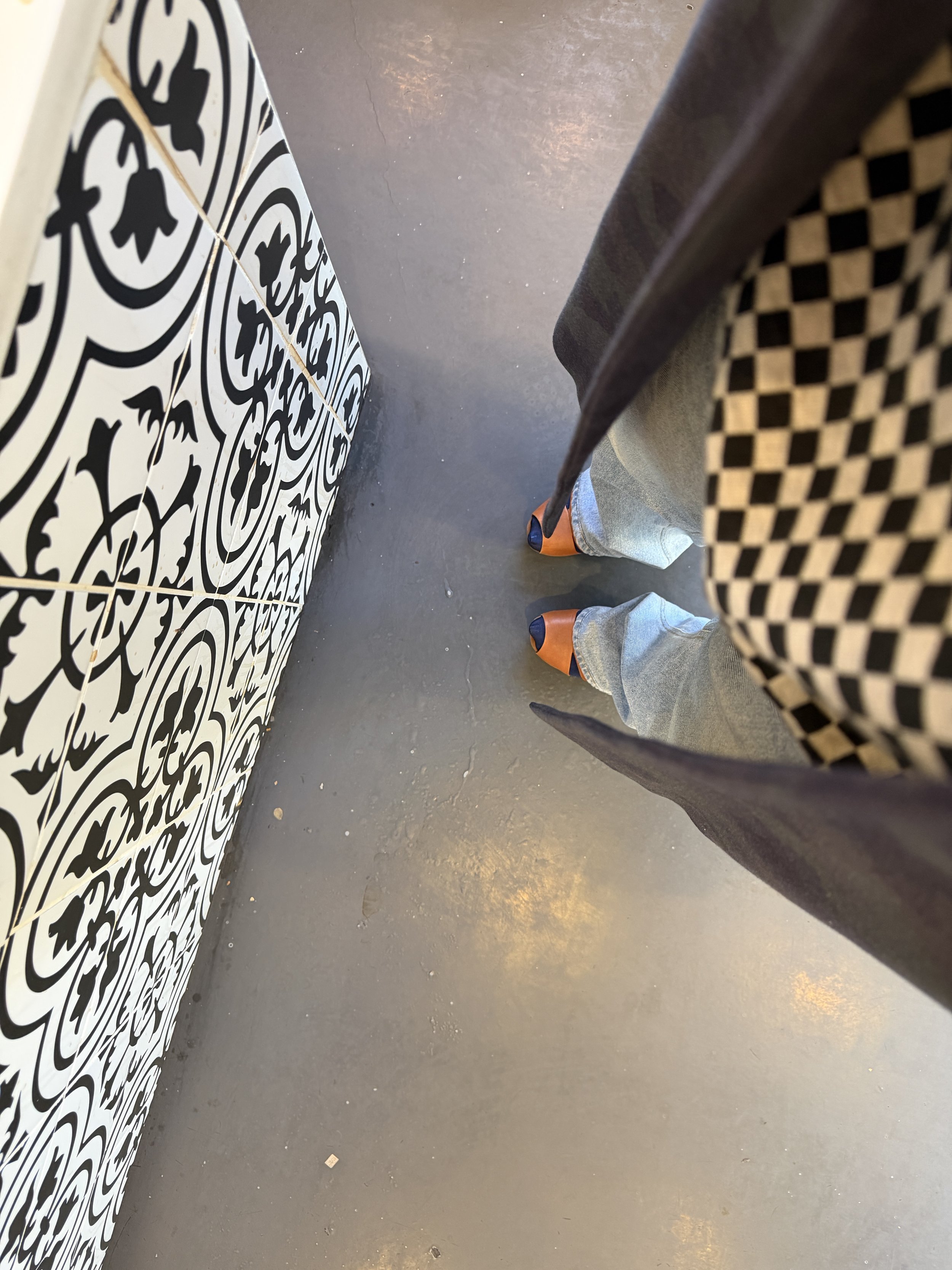 Checkerboard pattern styled casually with denim and platforms — everyday chic fall look