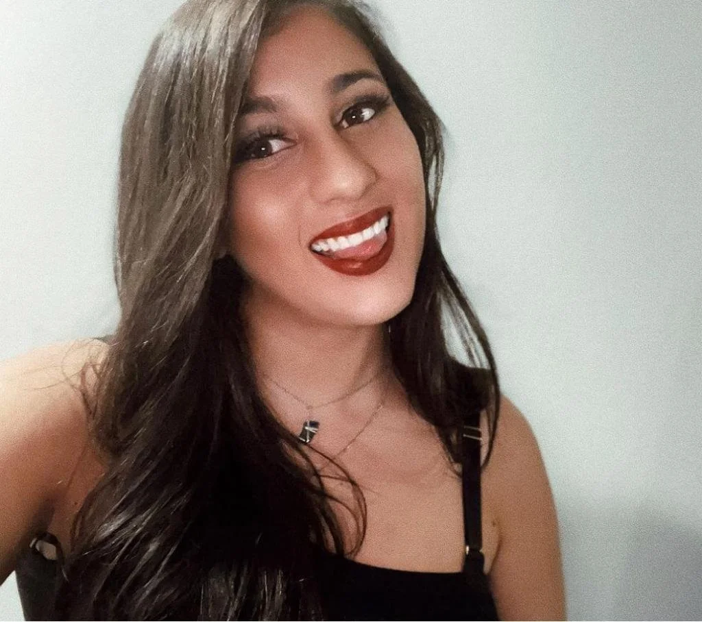 A woman smiling