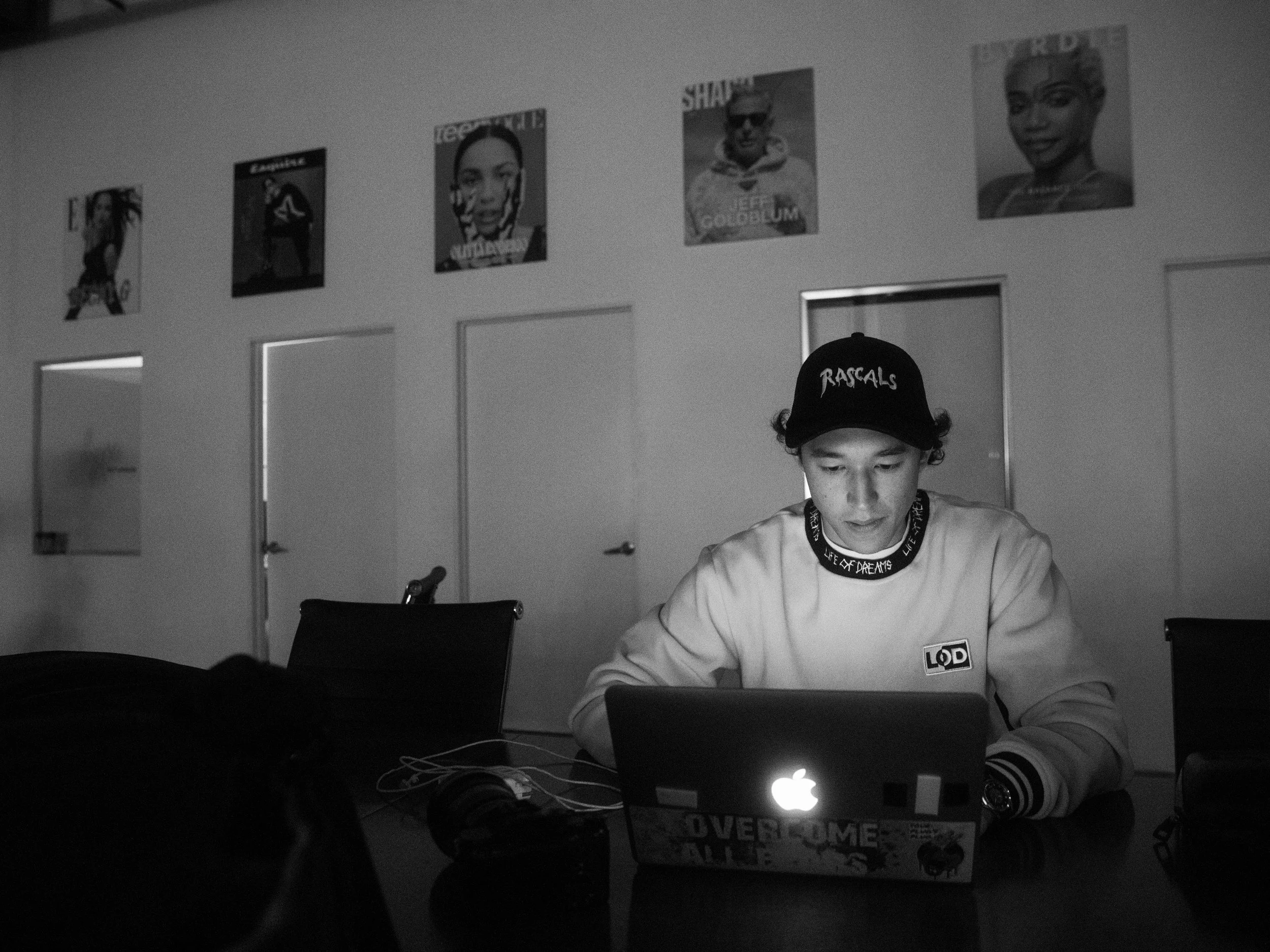 Creative producer working on a laptop inside Hype Studios in Silver Lake, Los Angeles.
