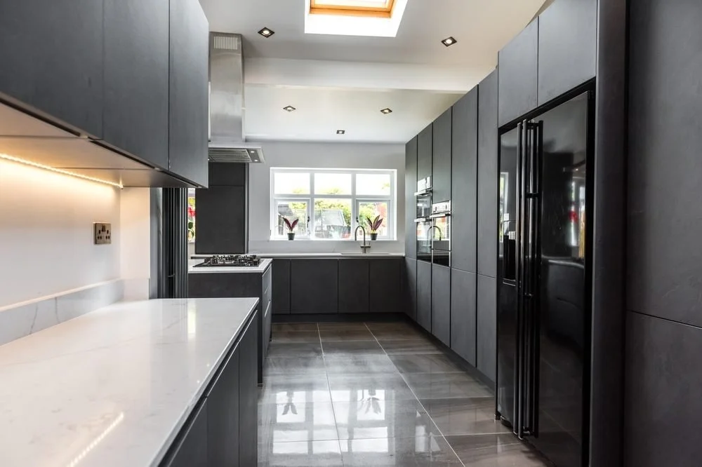 Elevating Your Lifestyle Through Thoughtful Home Design. Beautiful grey slate and marble European style modern home kitchen. Elegant minimal home interior style decor. Luxury living standards at home..