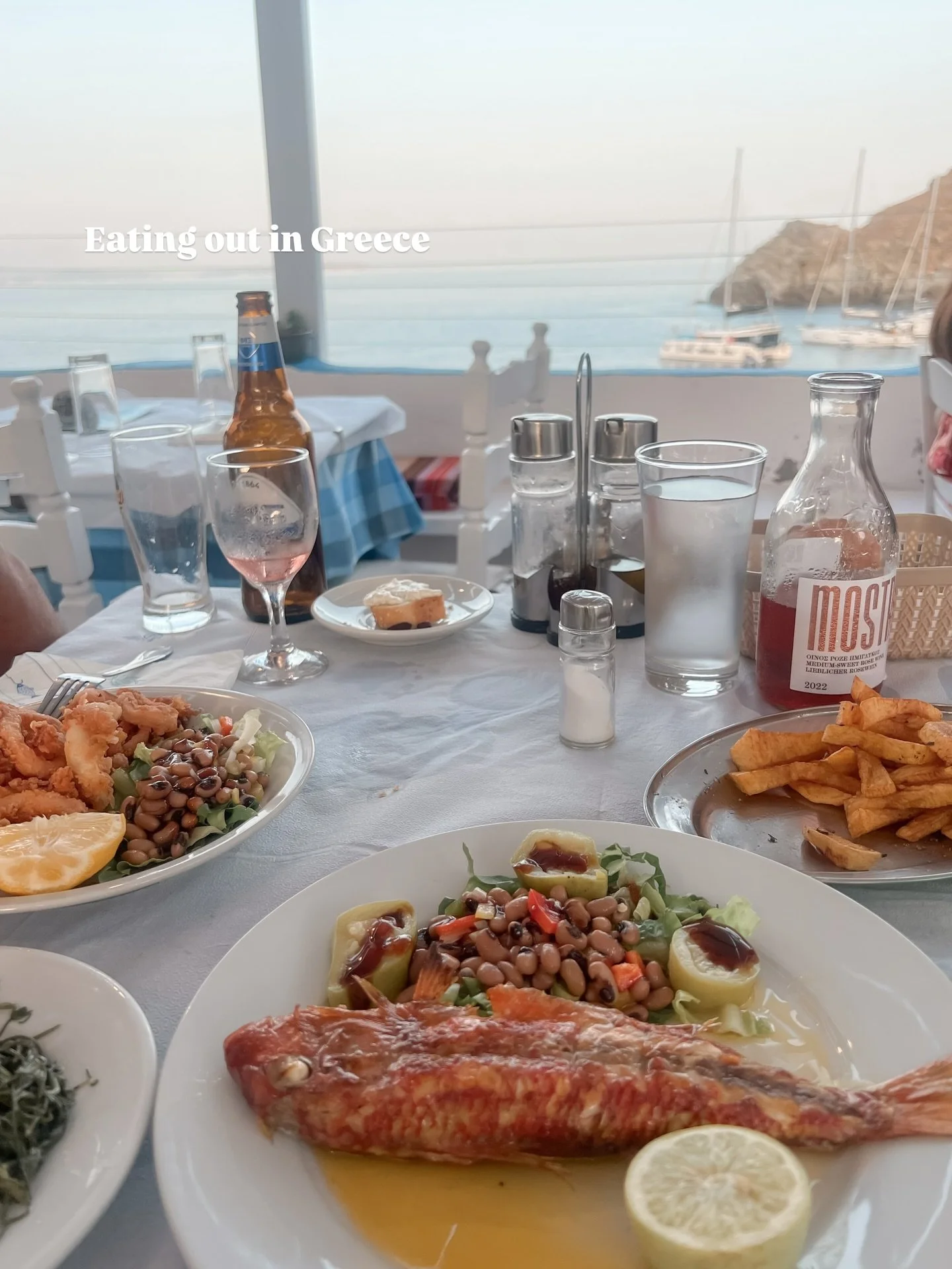 Eating out in Greece is an experience, a wonderful delicious experience 🍷 

Shared plates, food in the middle, carafes of house wine, no rush just pure enjoyment.

I&rsquo;ve written all about eating out in Greece on a new blogpost. The link is in m
