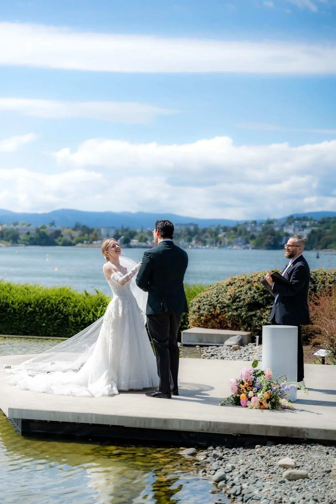 When the joy literally lifts you off the ground. 🙌🤍

S &amp; D's waterfront wedding at @innatlaurelpoint was laughter, light, and a couple who simply could not stop smiling.
Officiant: @heylorddaniell | @vancouverofficiant
Photography: @van.islande