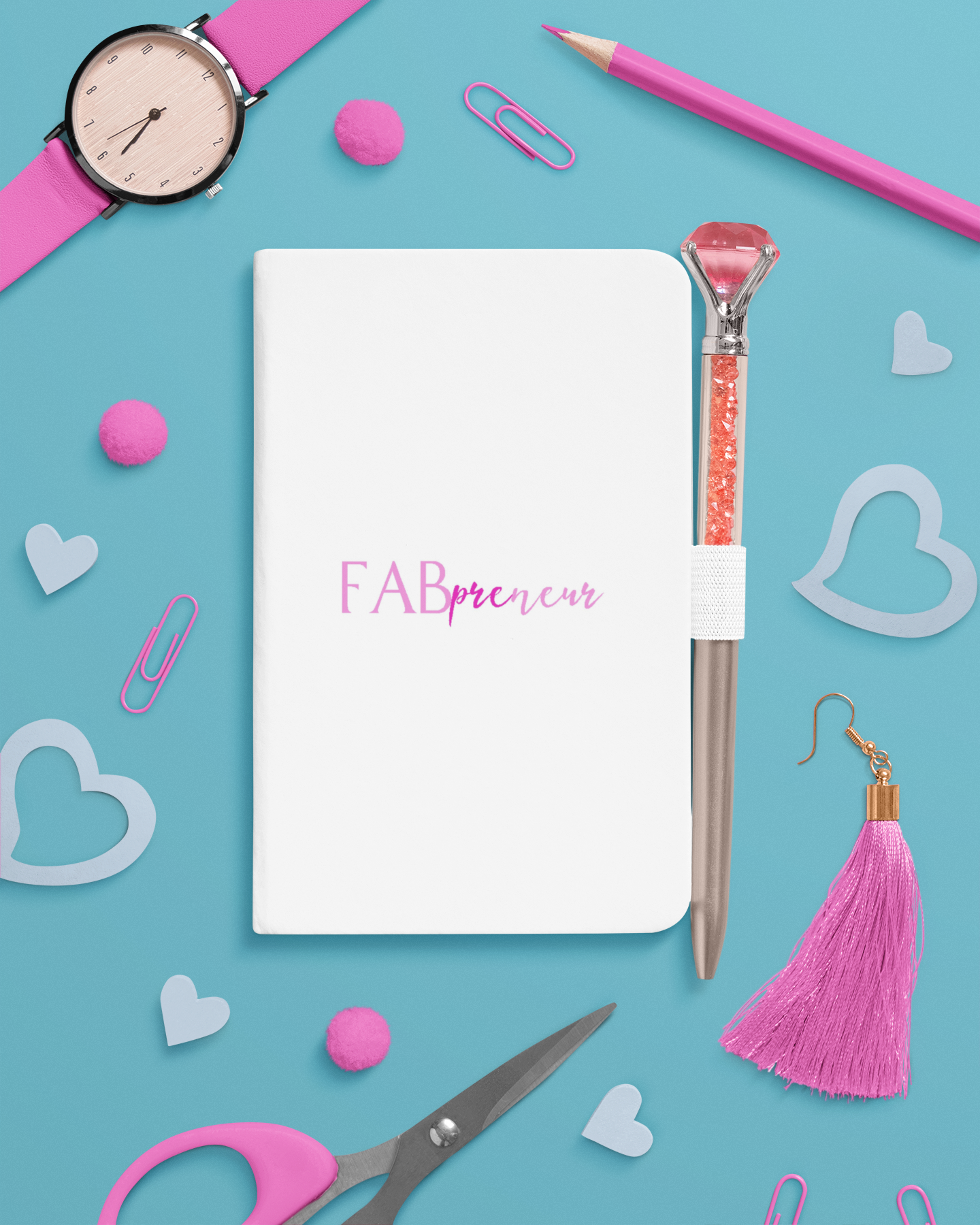 mockup-of-a-notebook-next-to-a-pen-and-school-supplies-m28874-r-el2.png