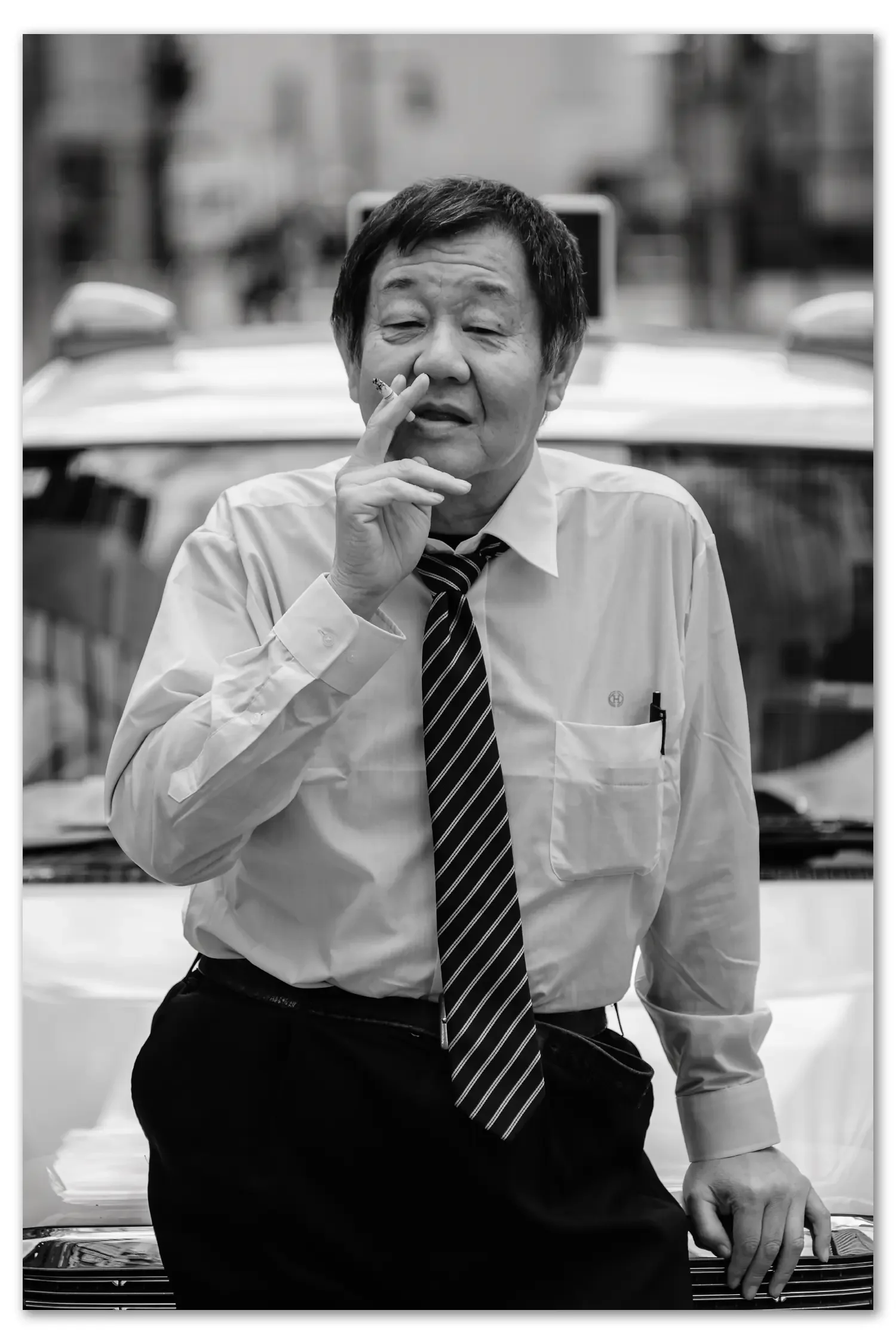 A Shinagawa cab driver poses for street portrait photography.
