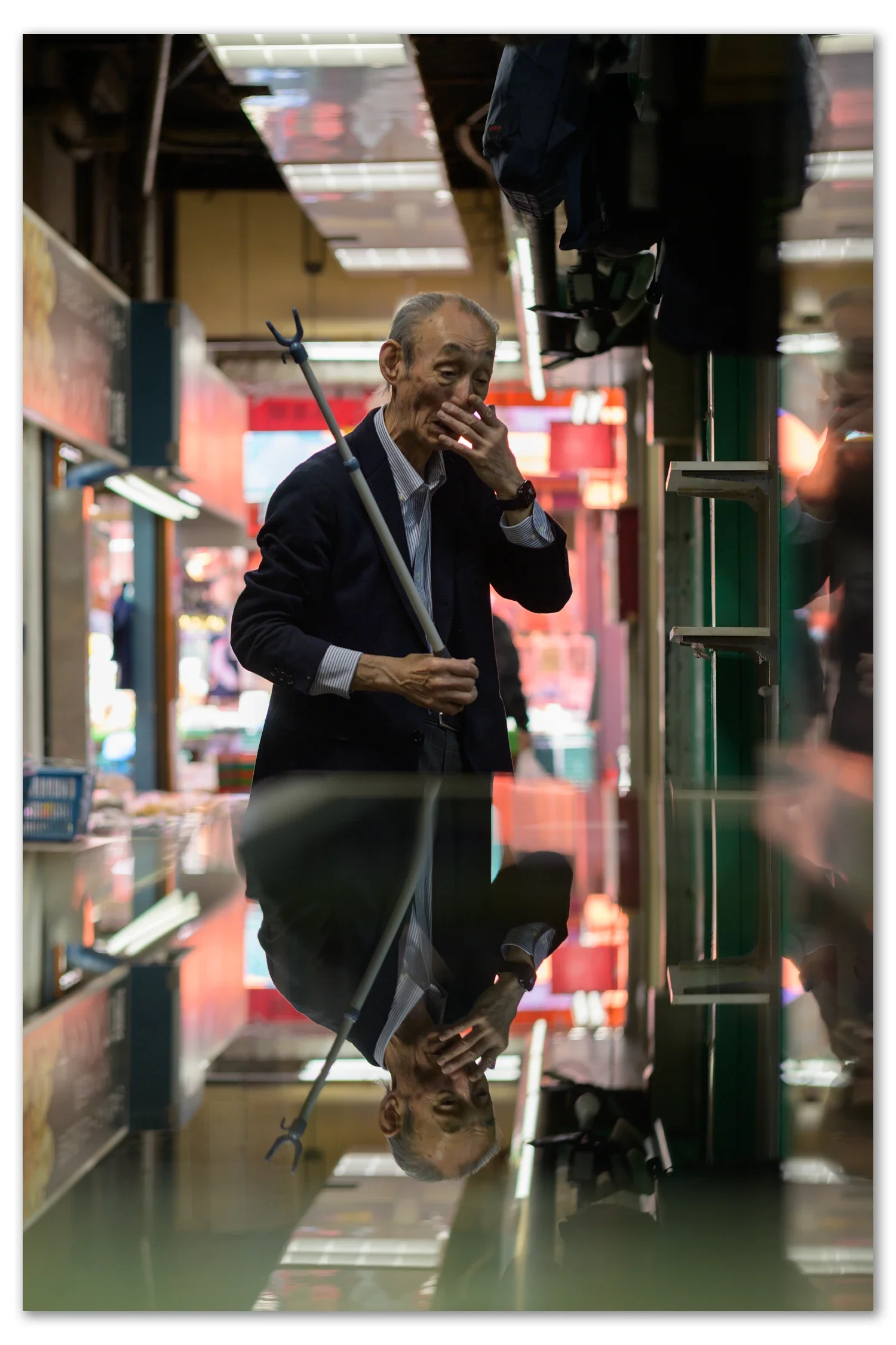 Shop keeper in Ueno Market Street Photography Masterclass