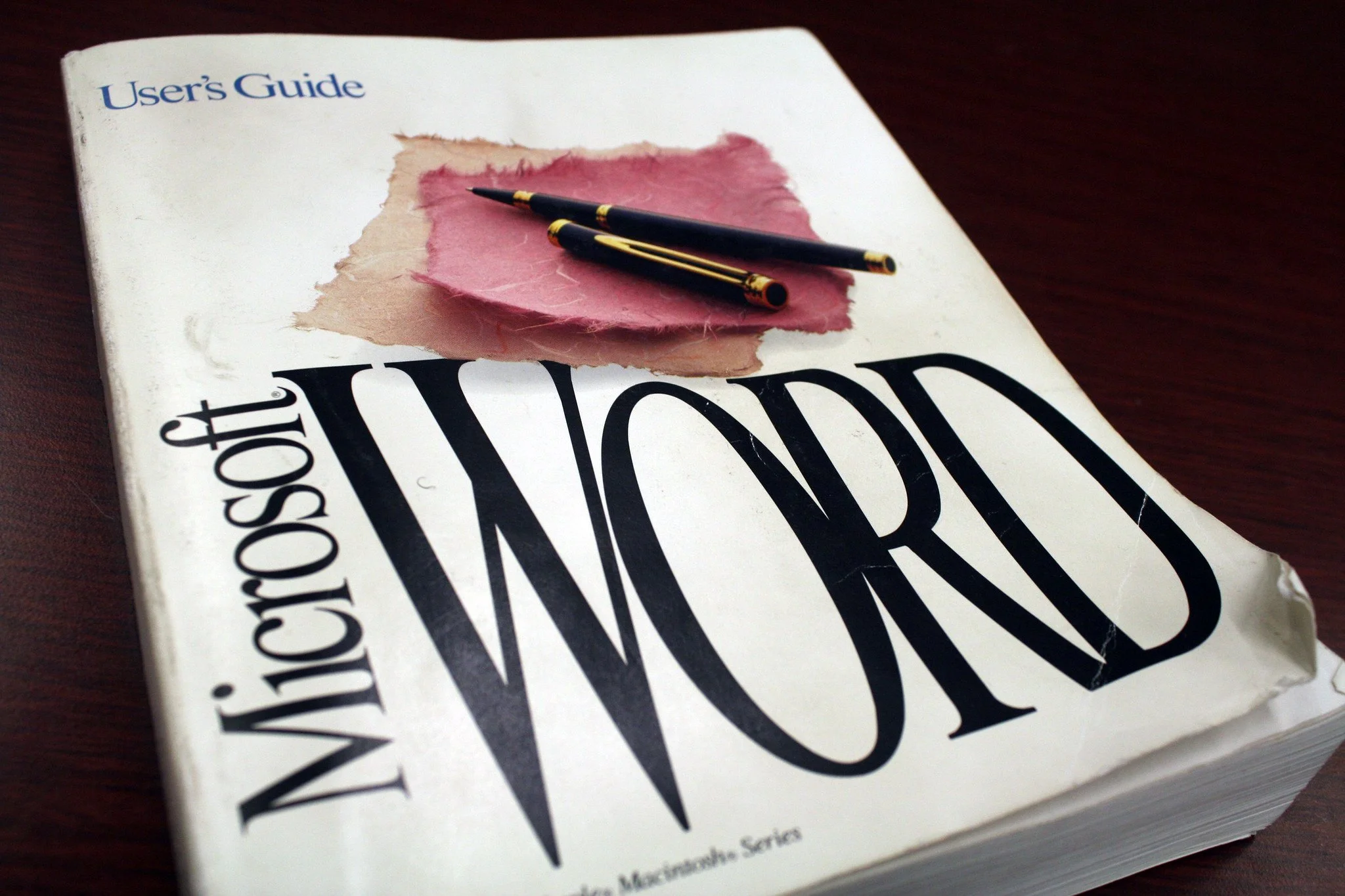 Front cover of a used copy of the Microsoft Word user's guide.