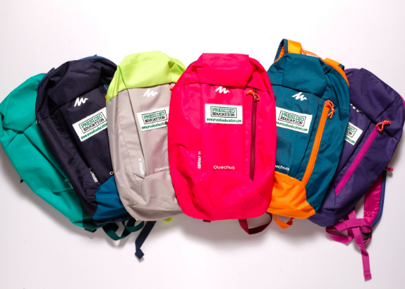 Colorful handpicked backpacks to be donated. Presidio Education®, 2018.