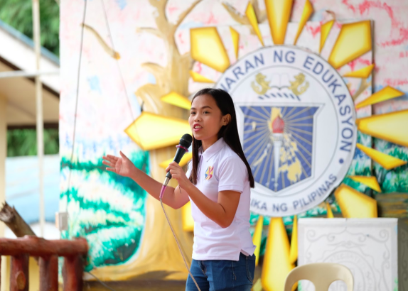 Barangay Adlaon Sangguniang Kabataan (Youth Council) Chairwoman, Honorable Lhyn Arcilla reminds all children to make good use of their backpacks and to make us all proud. Presidio Education®, 2018.