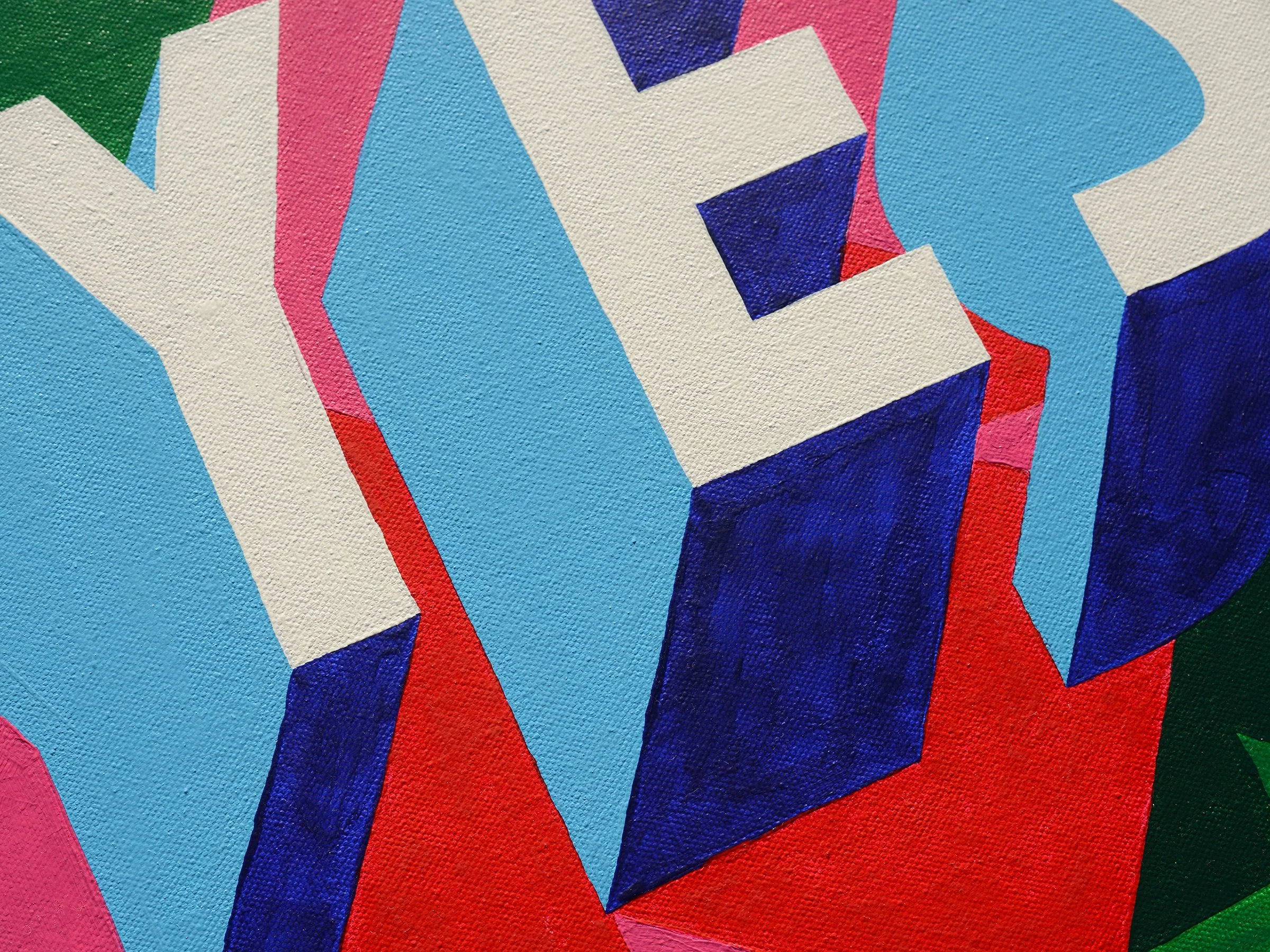 Close-up angle of the “YES” painting showing white and blue 3D letters with deep blue and red shadows.