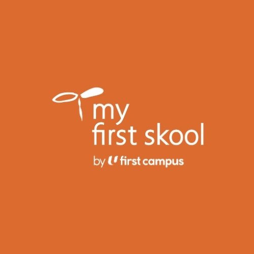 Orange background with white text reading "my first skool by first campus," with a stylized angel or halo over the "m" in "my."