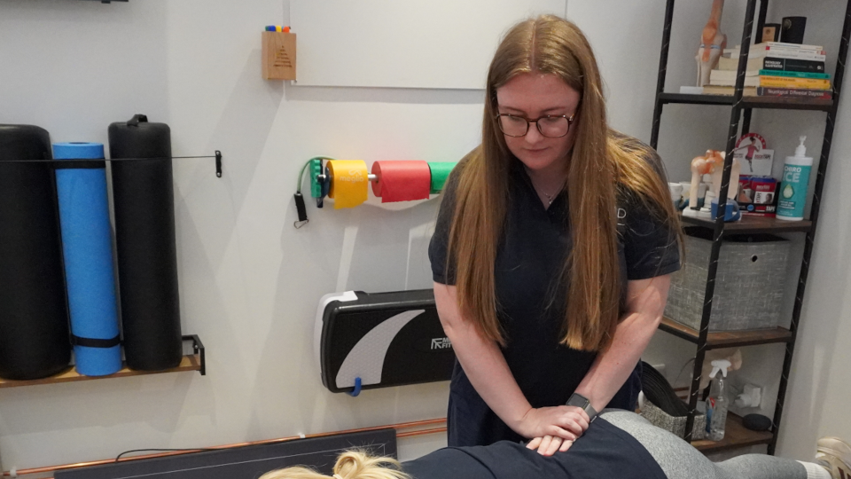 Chiropractor Yasmin going to work on a low back.