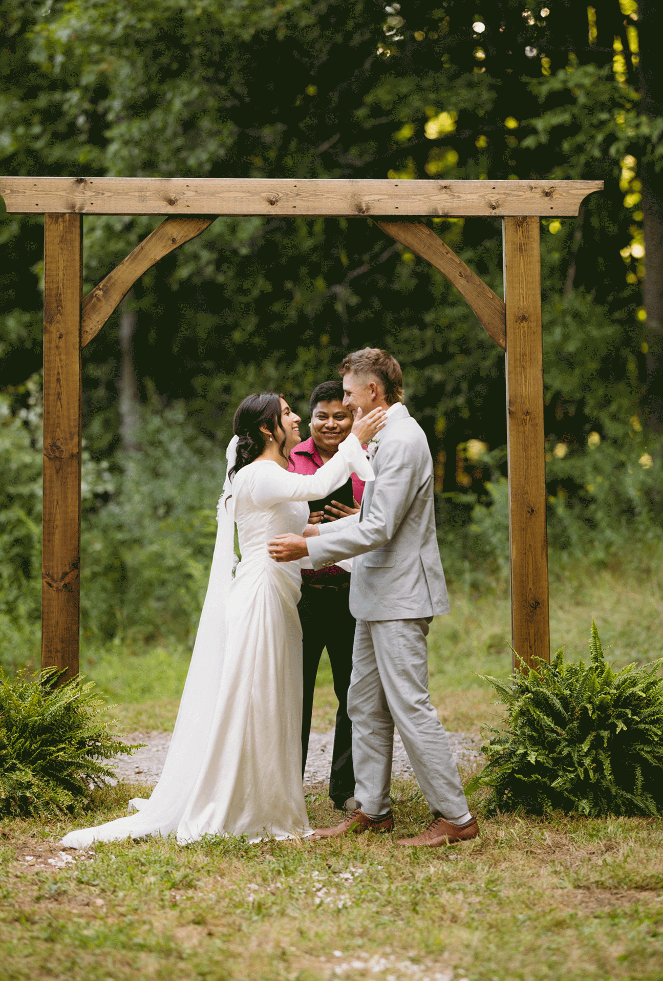The bride and groom share their first kiss as husband and wife.
