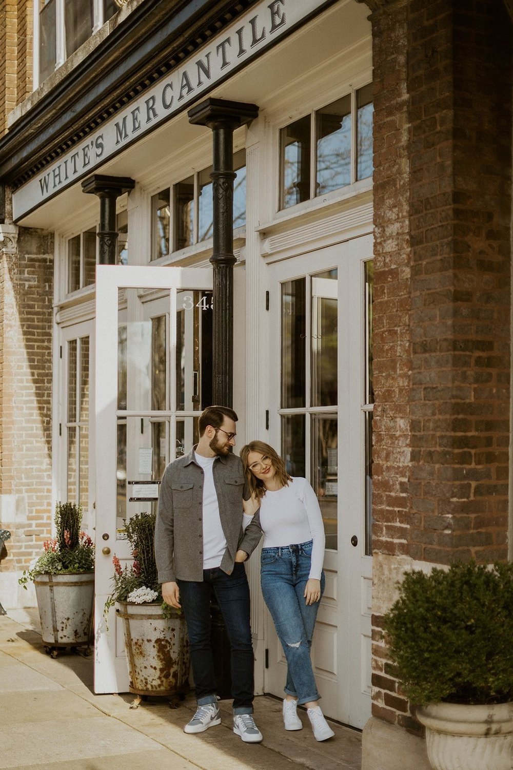 Couple standing in front of White's Mercantile