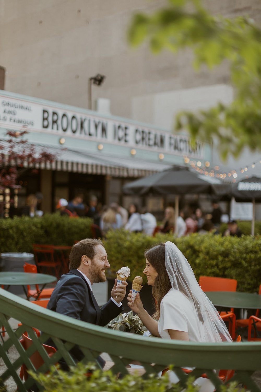 Couple smiling while sharing some of their favorite ice creams at Brooklyn Ice Cream Company