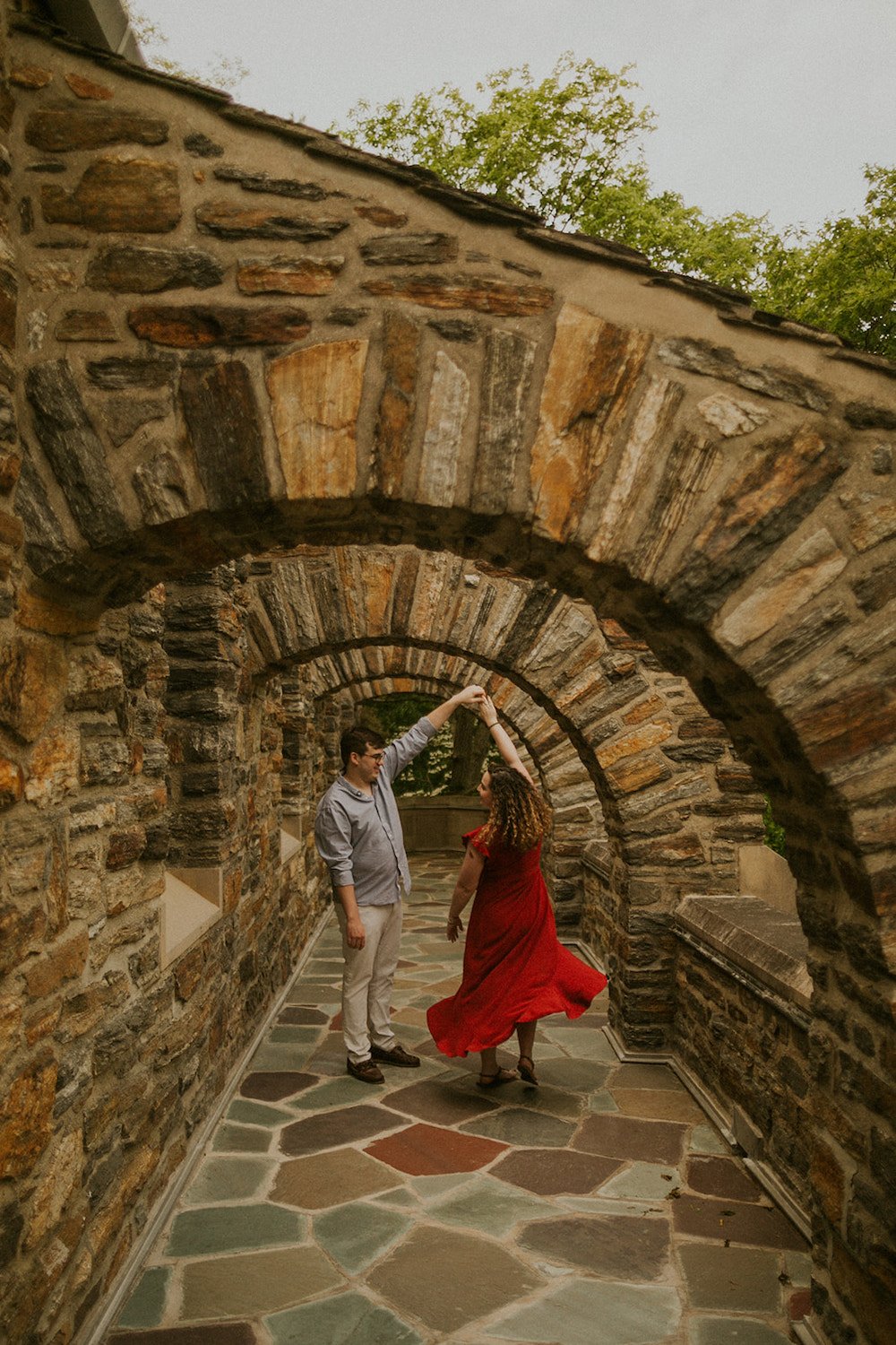 Couple dances together on the deck of Garrett Church