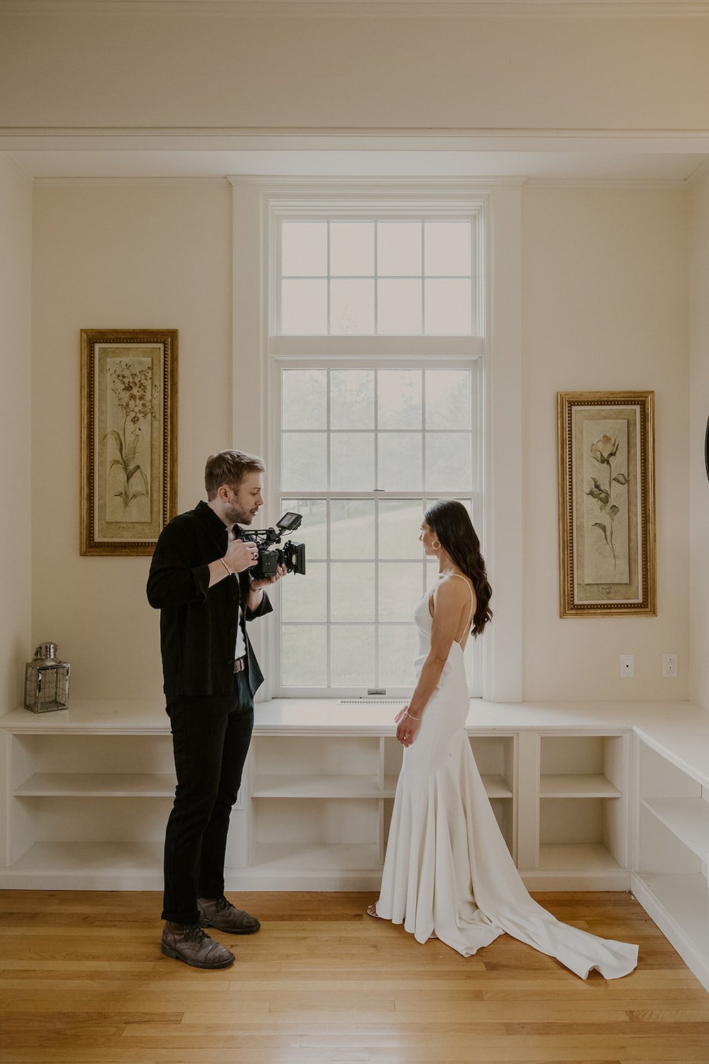 Jonah Paulhamus records the bride after she is fully dressed in her wedding attire. 
