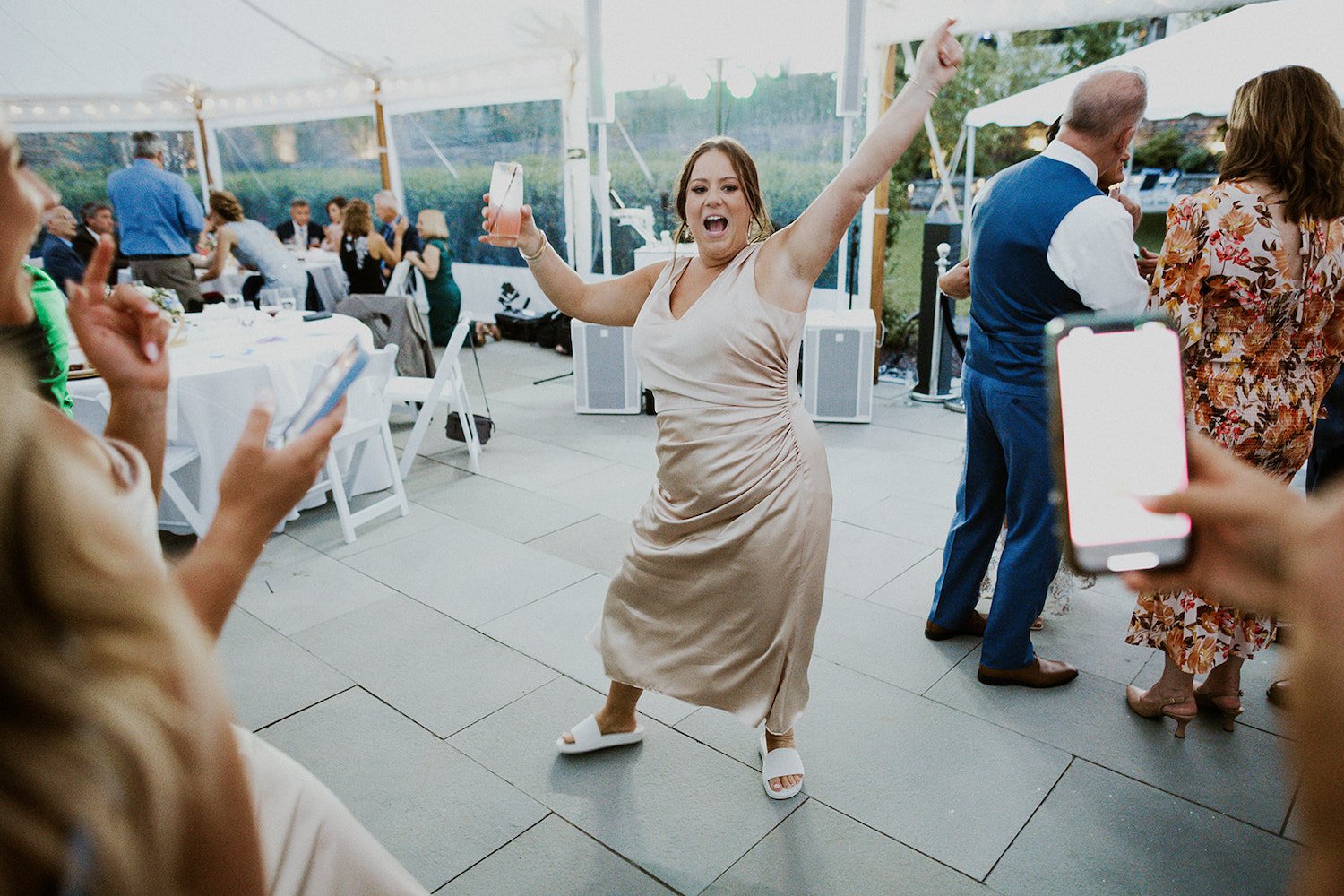Bridesmaid poses while dancing to one her favorite songs. 