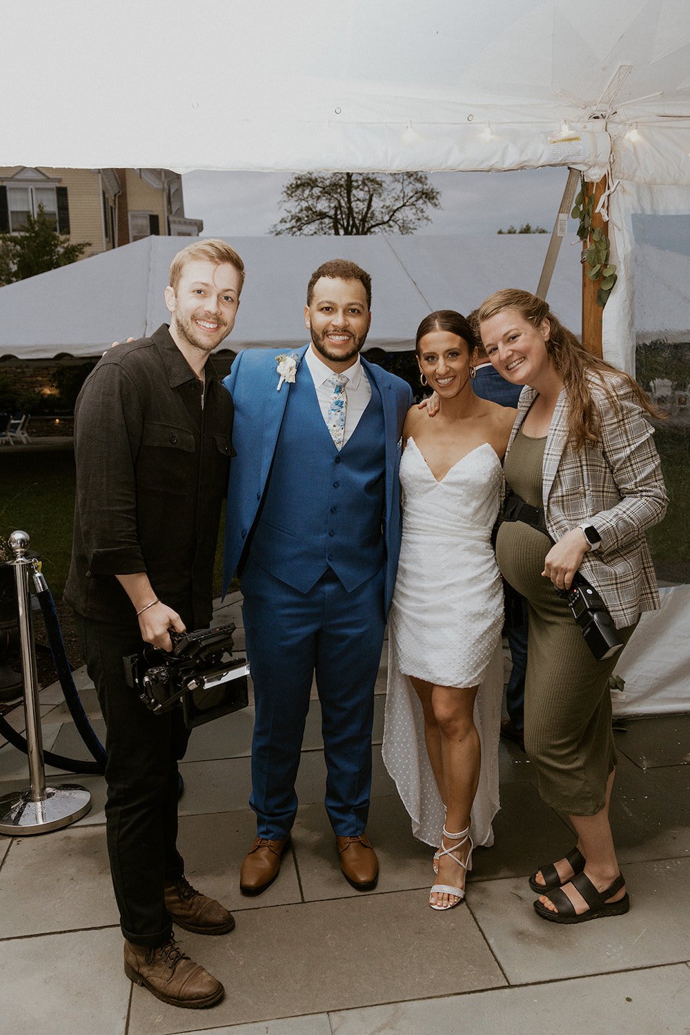 Bride and Groom snap a photo with Emilee Carpenter and Jonah Paulhamus