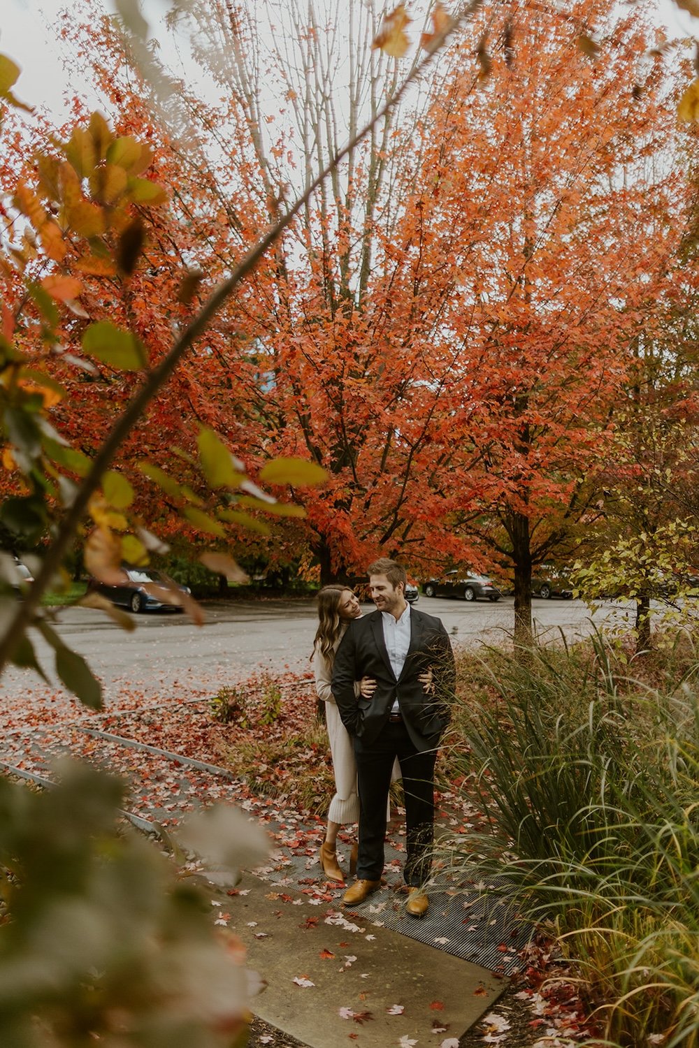  The couple standing under the fall foliage at the Cornell Botanic Gardens.  