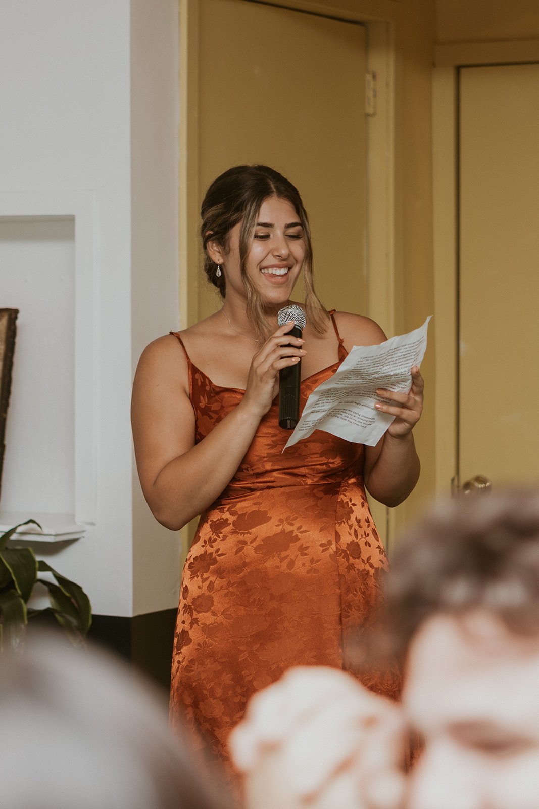 Maid of Honor makes her speech to the happy couple. 